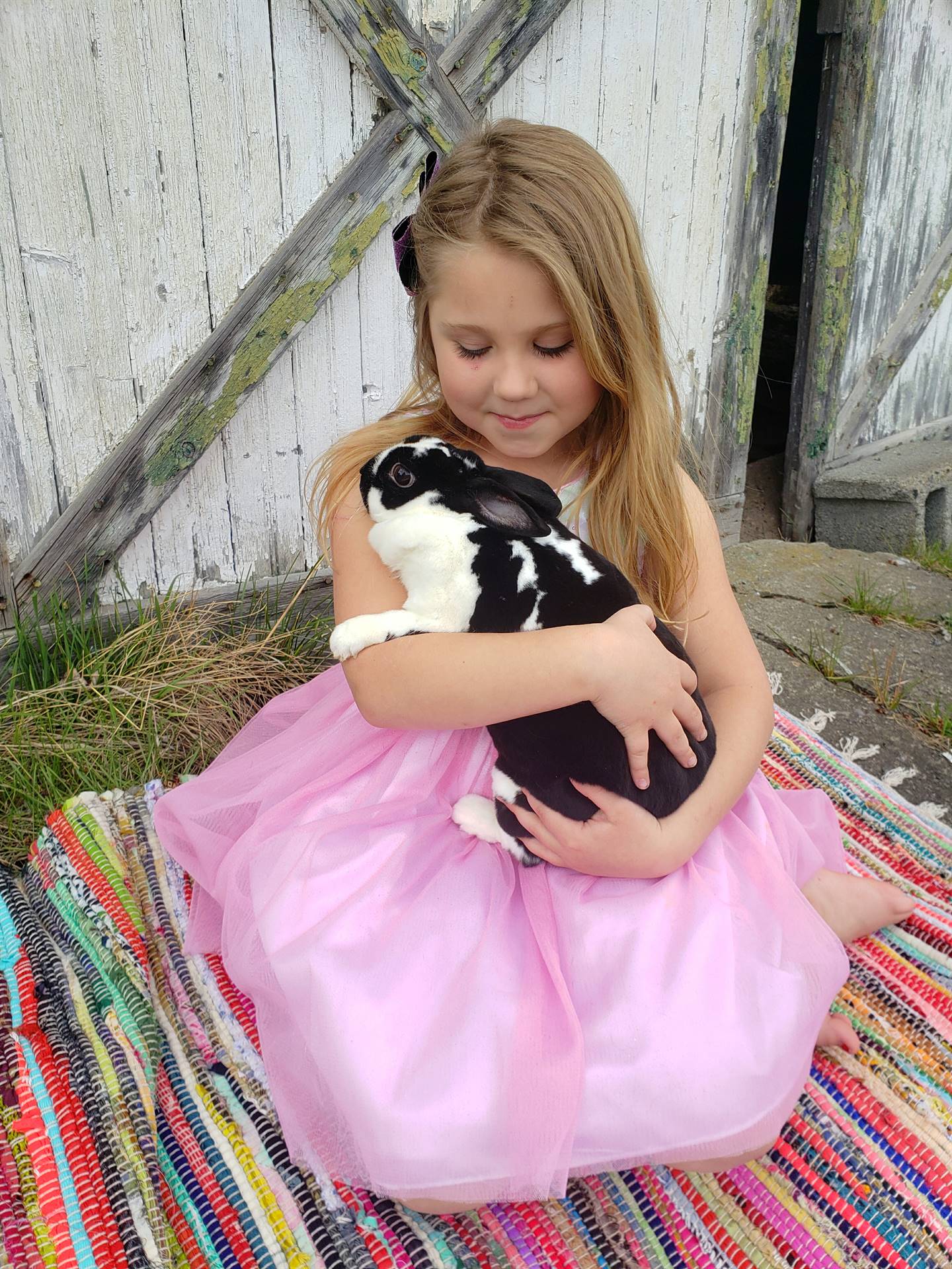 A child with her rabbit