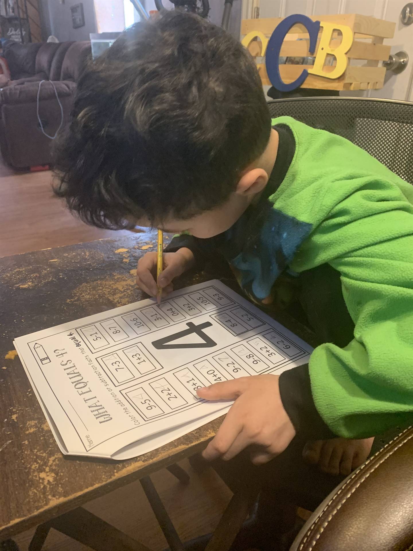 A boy doing math.