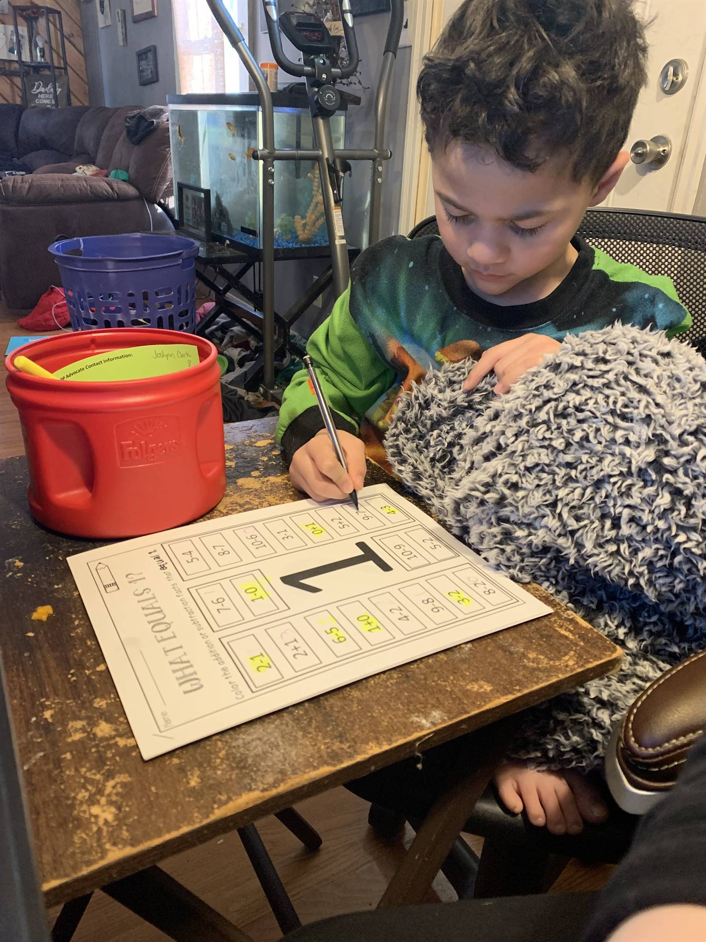 A boy doing math.
