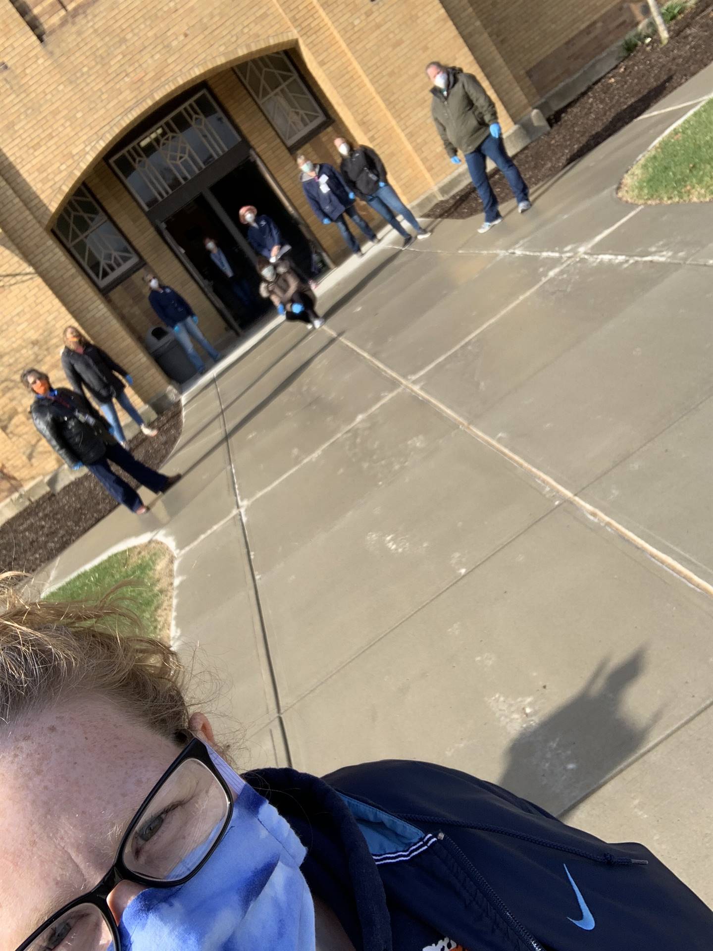 staff in front of school