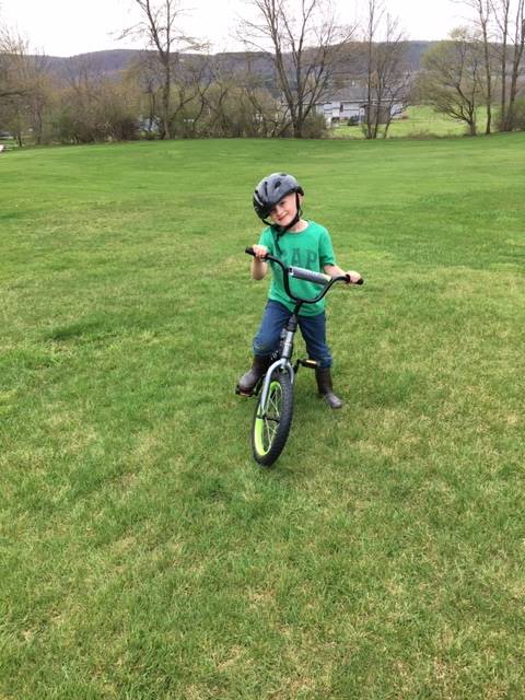 child riding bike