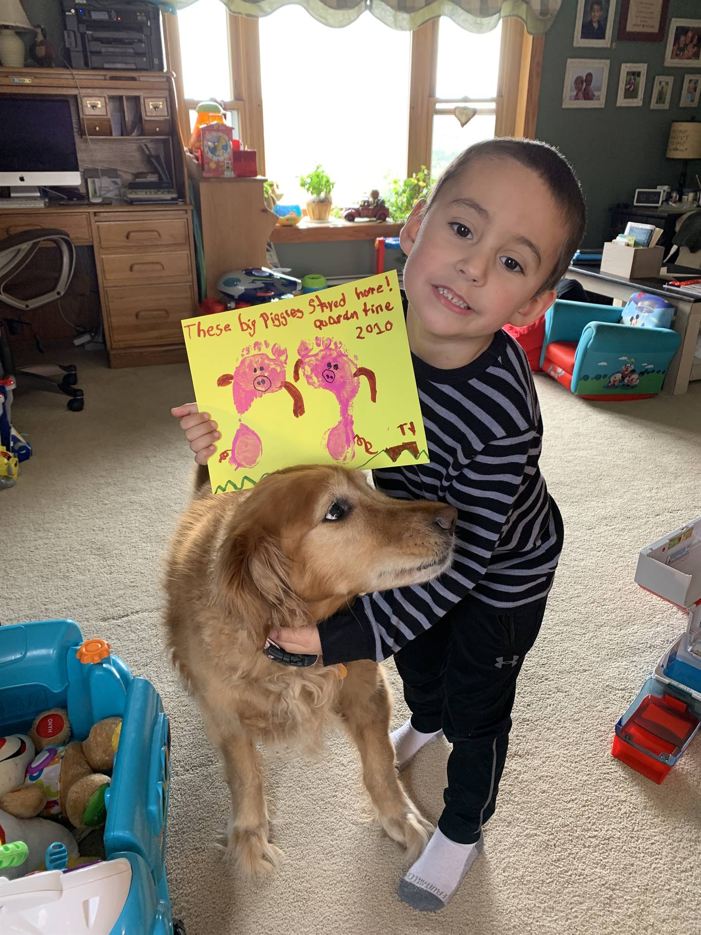 Boy with dog and craft for mother's day