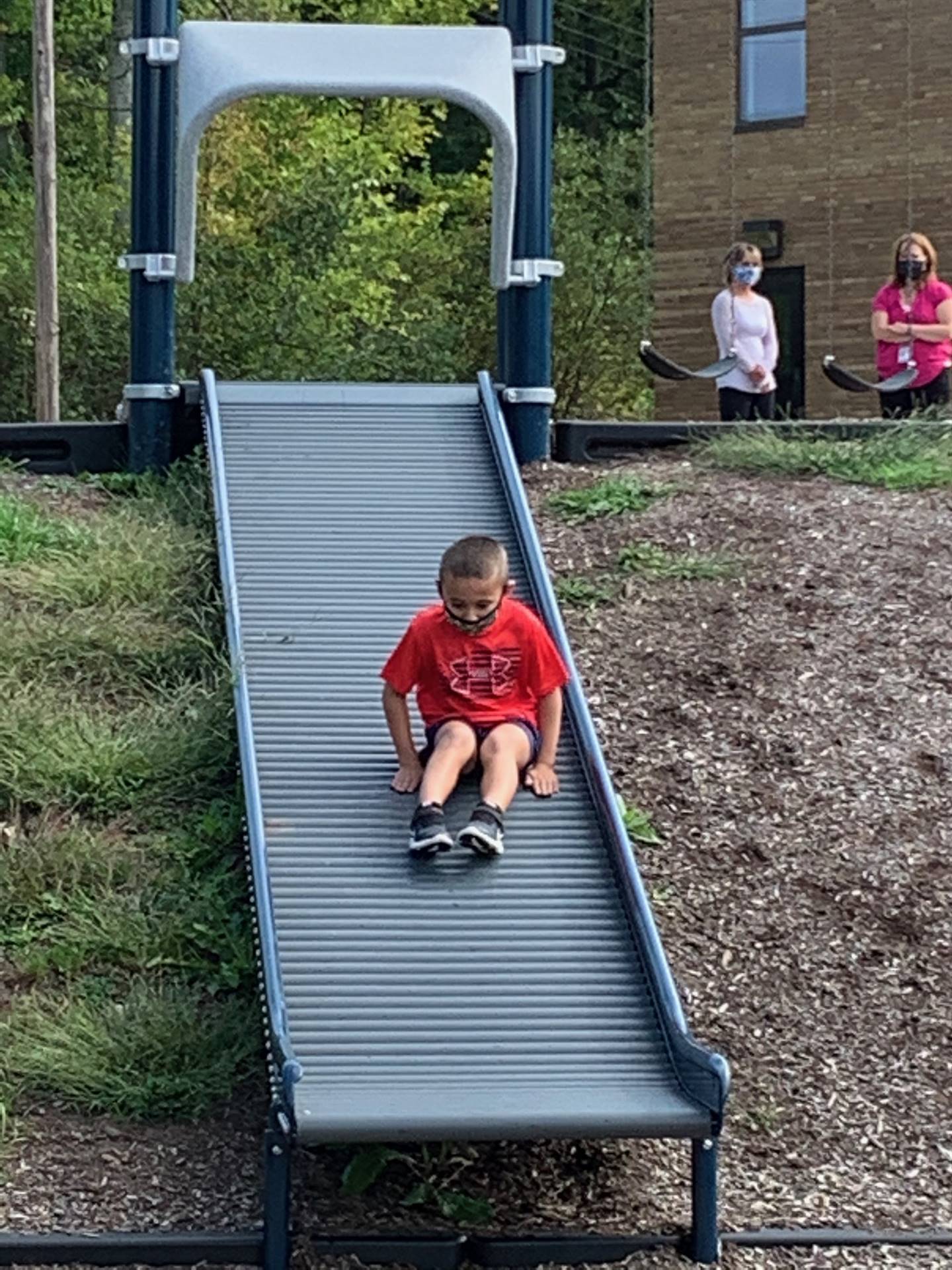 student on roller slide