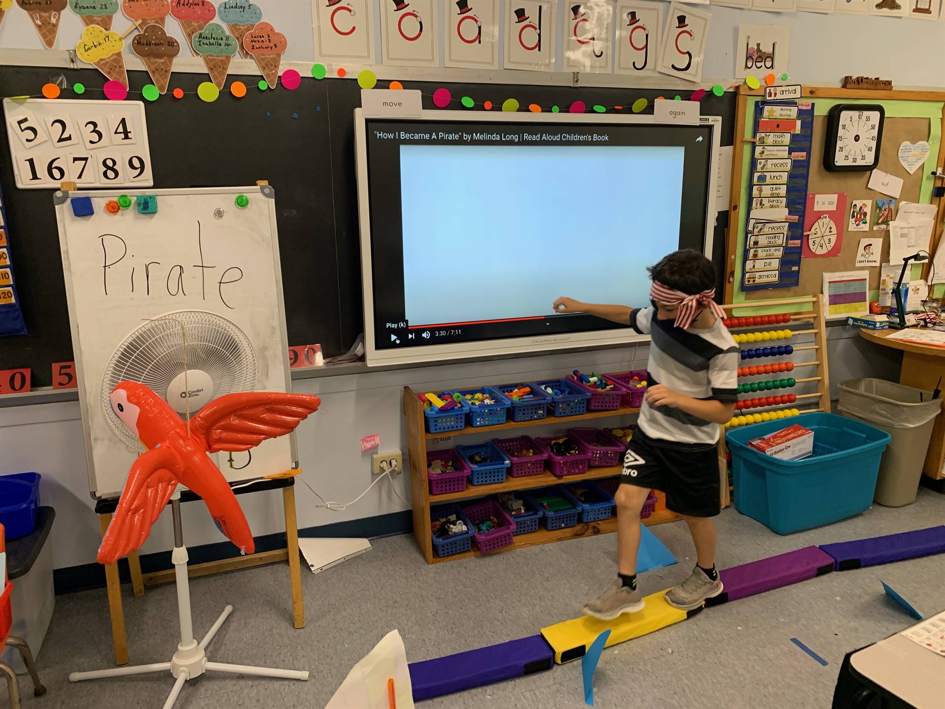 A student pirate walking the "plank".