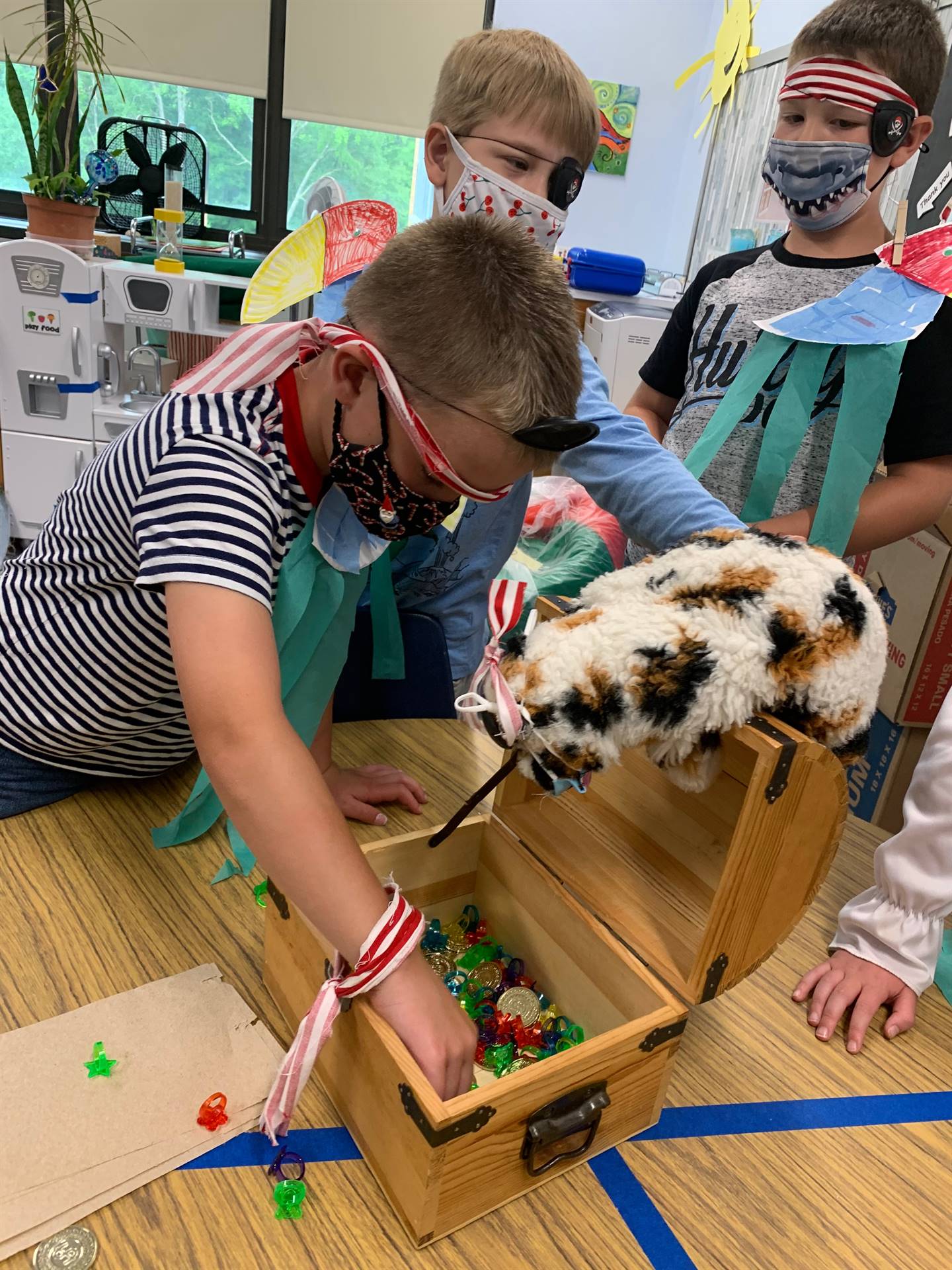 a group of student pirates find the gold treasure box.