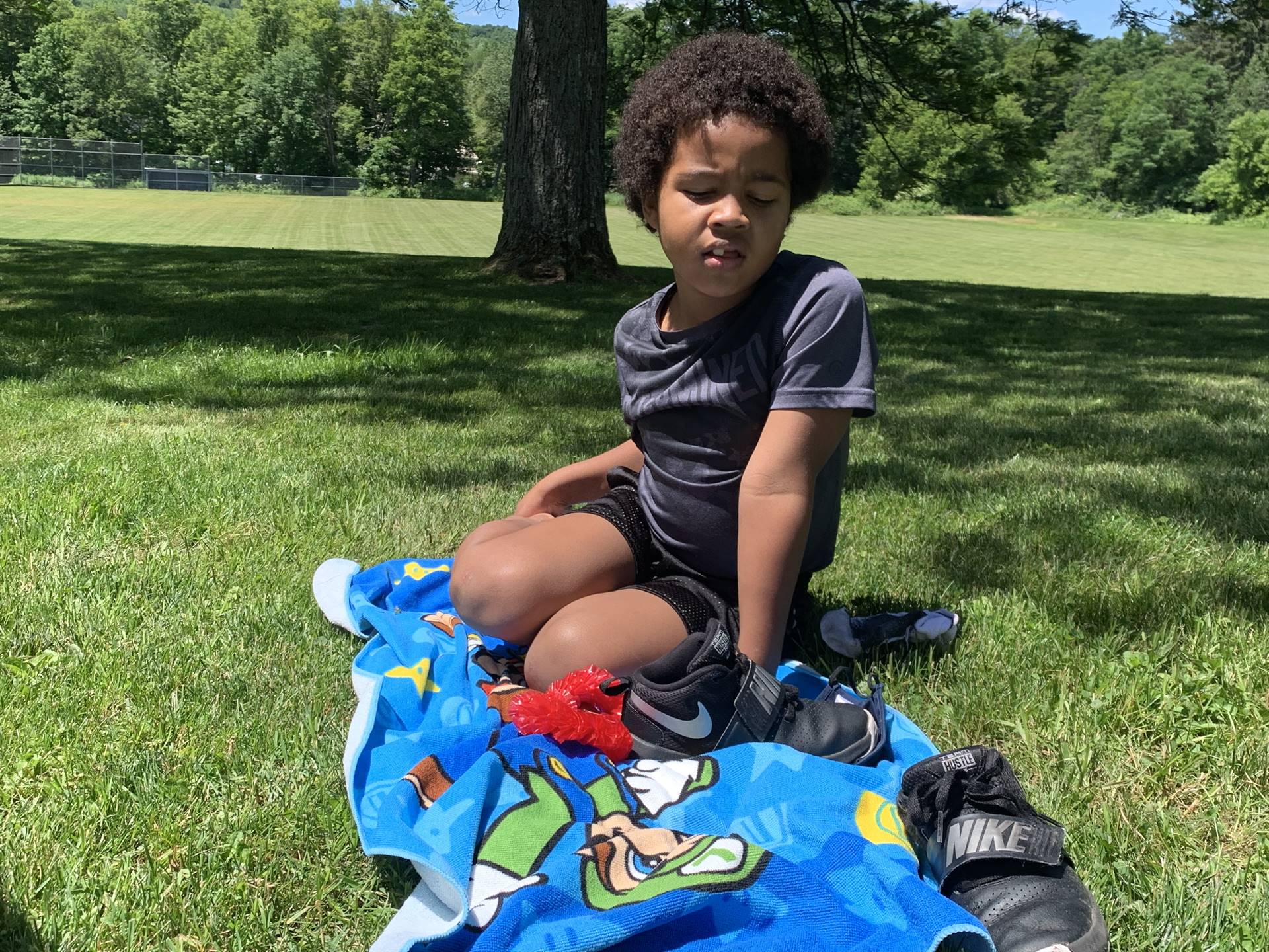 a student on a beach towel 