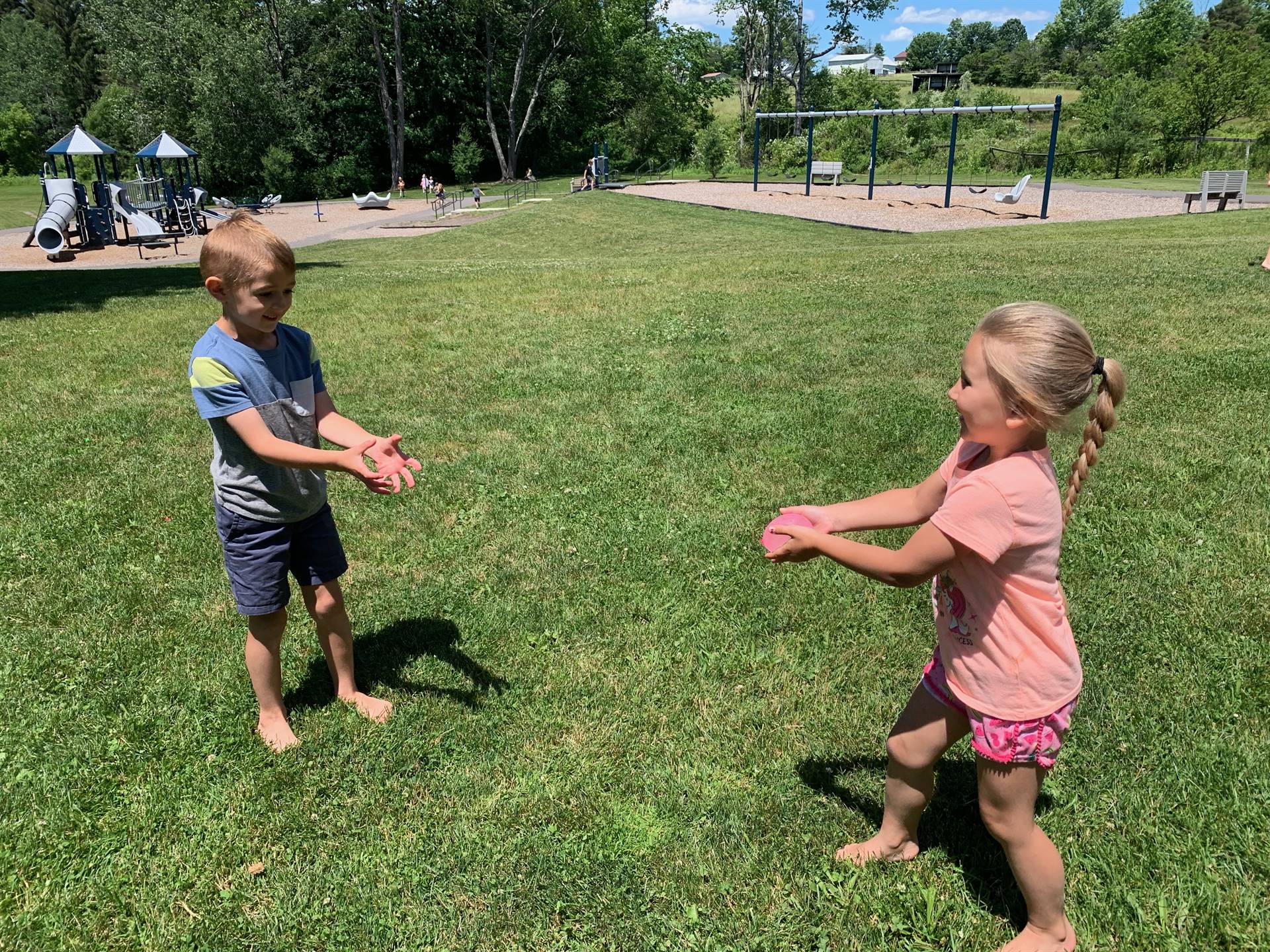 students toss water balloon