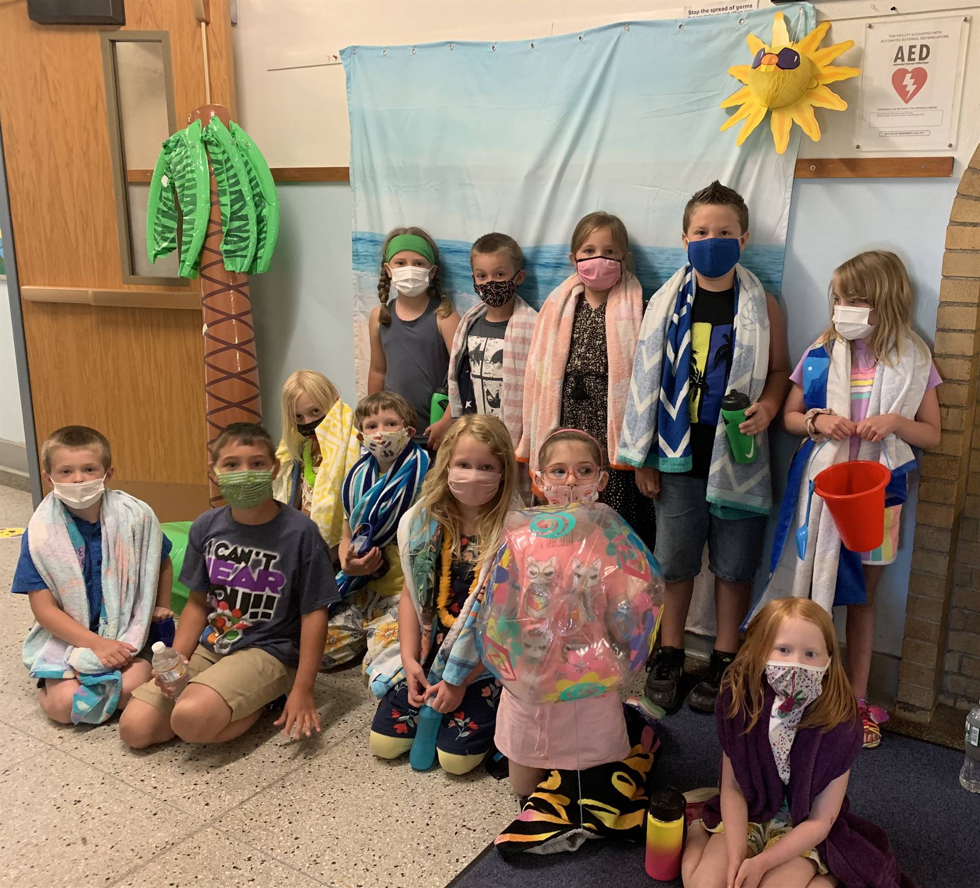 1st grade students with beach & ocean backdrop