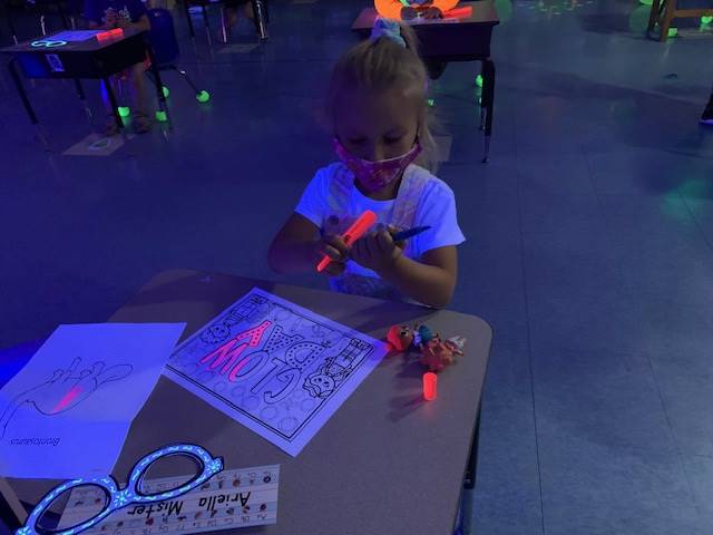Student fun with "glowing" items