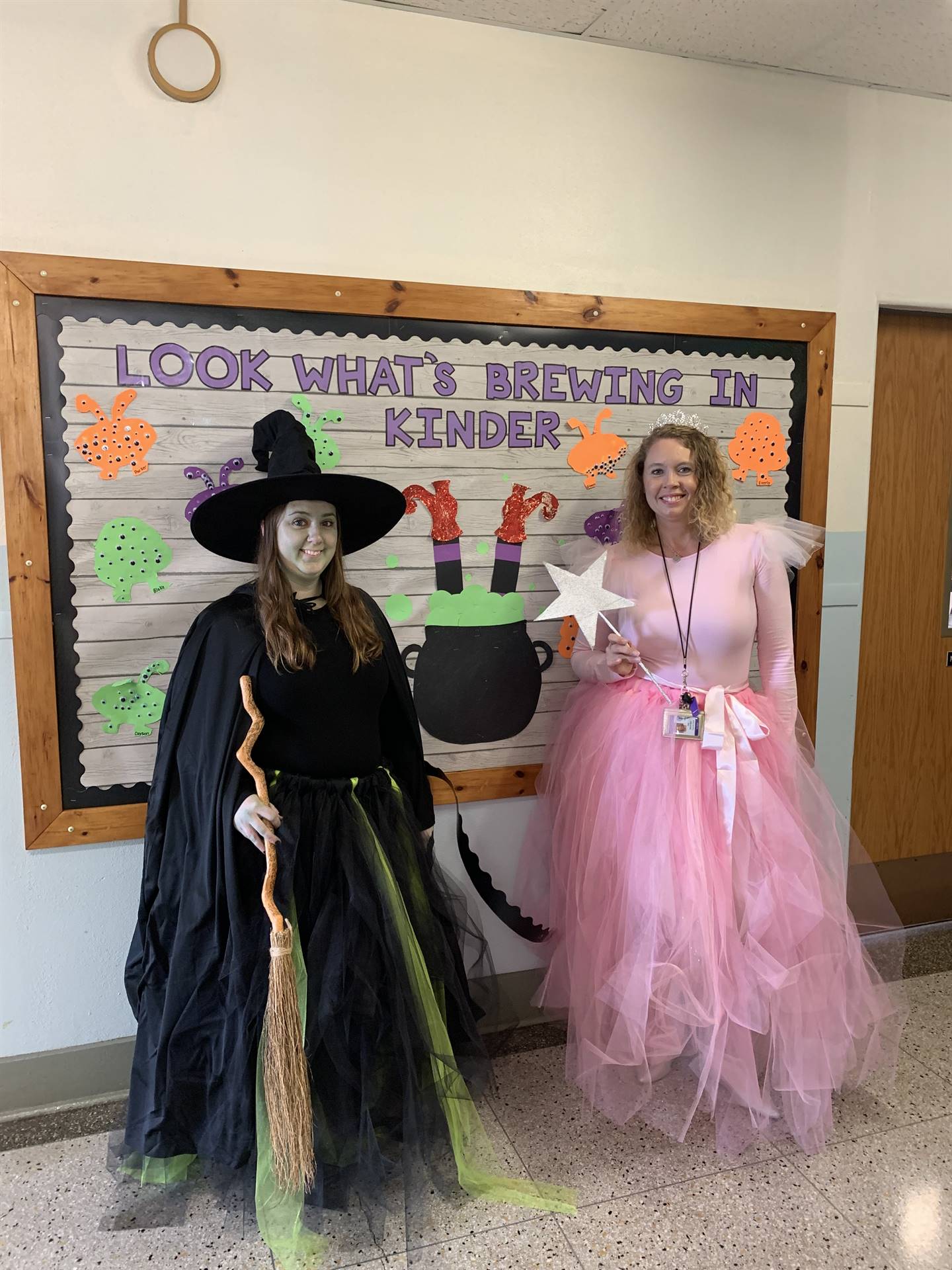 The good witch in pink and the bad witch in black. 