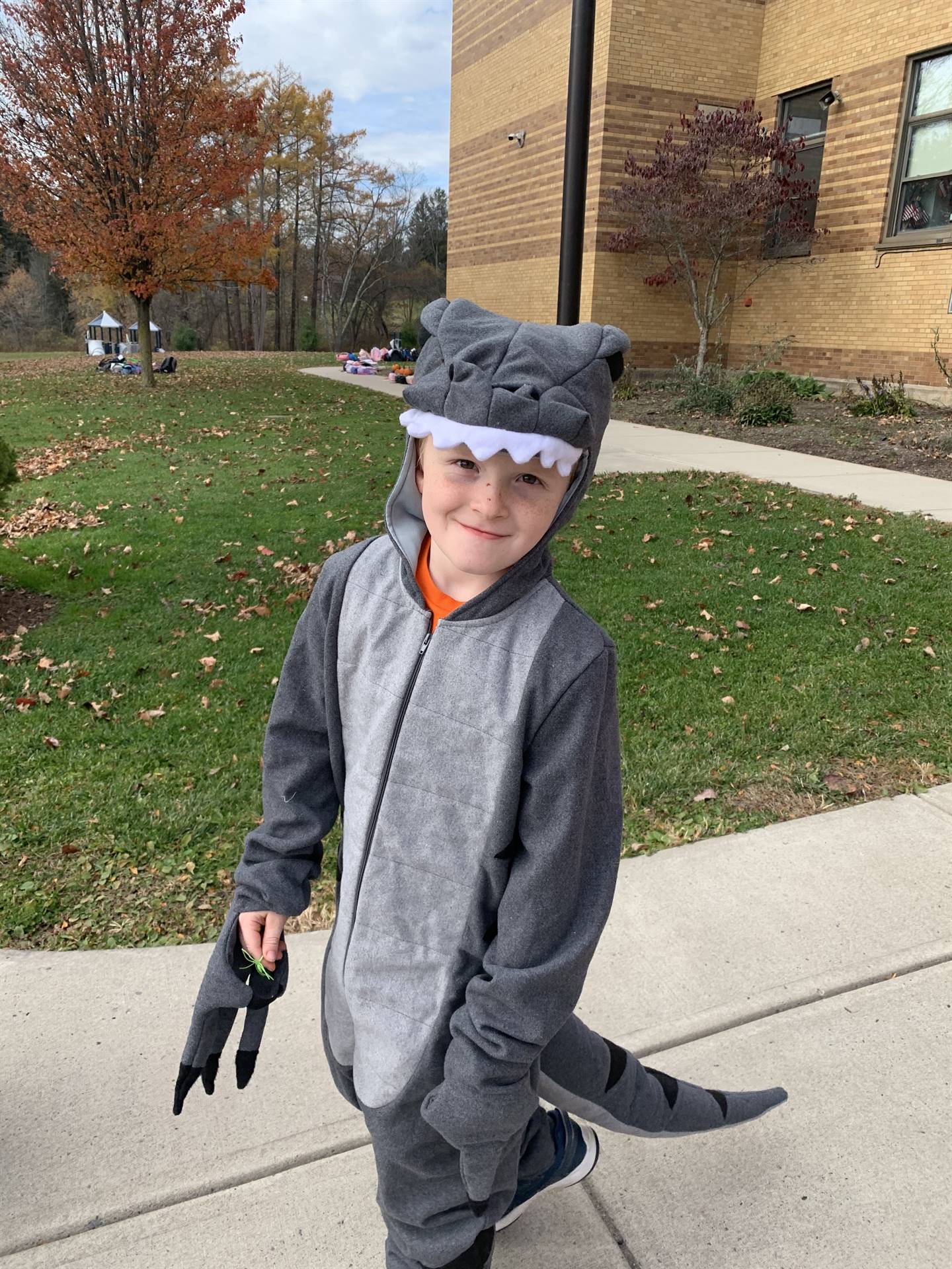 student dressed as a dinosaur