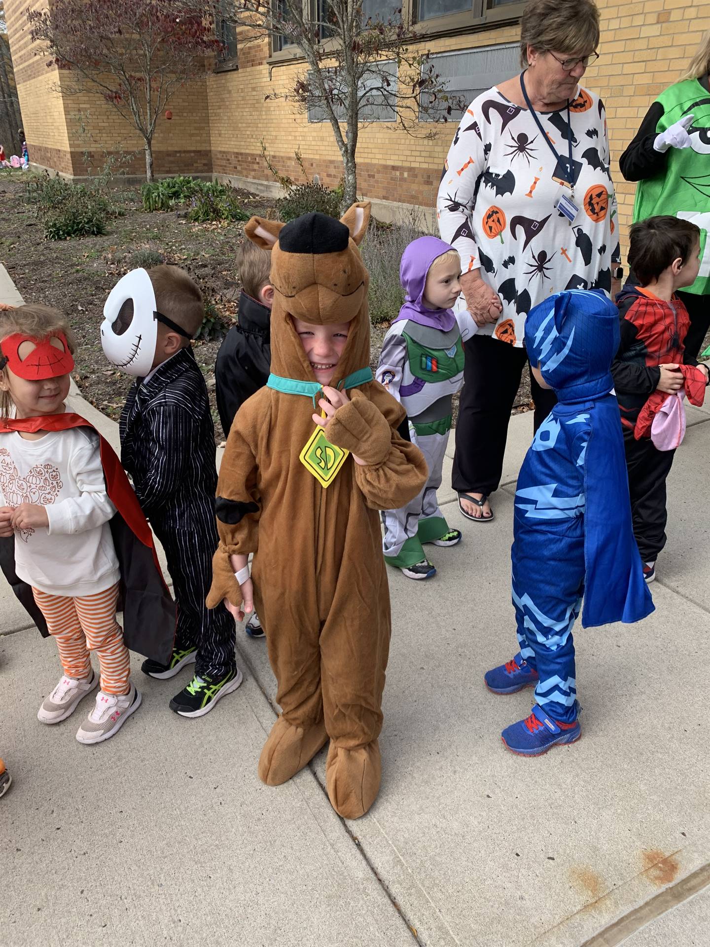 A scooby doo student with other students dressed up. 