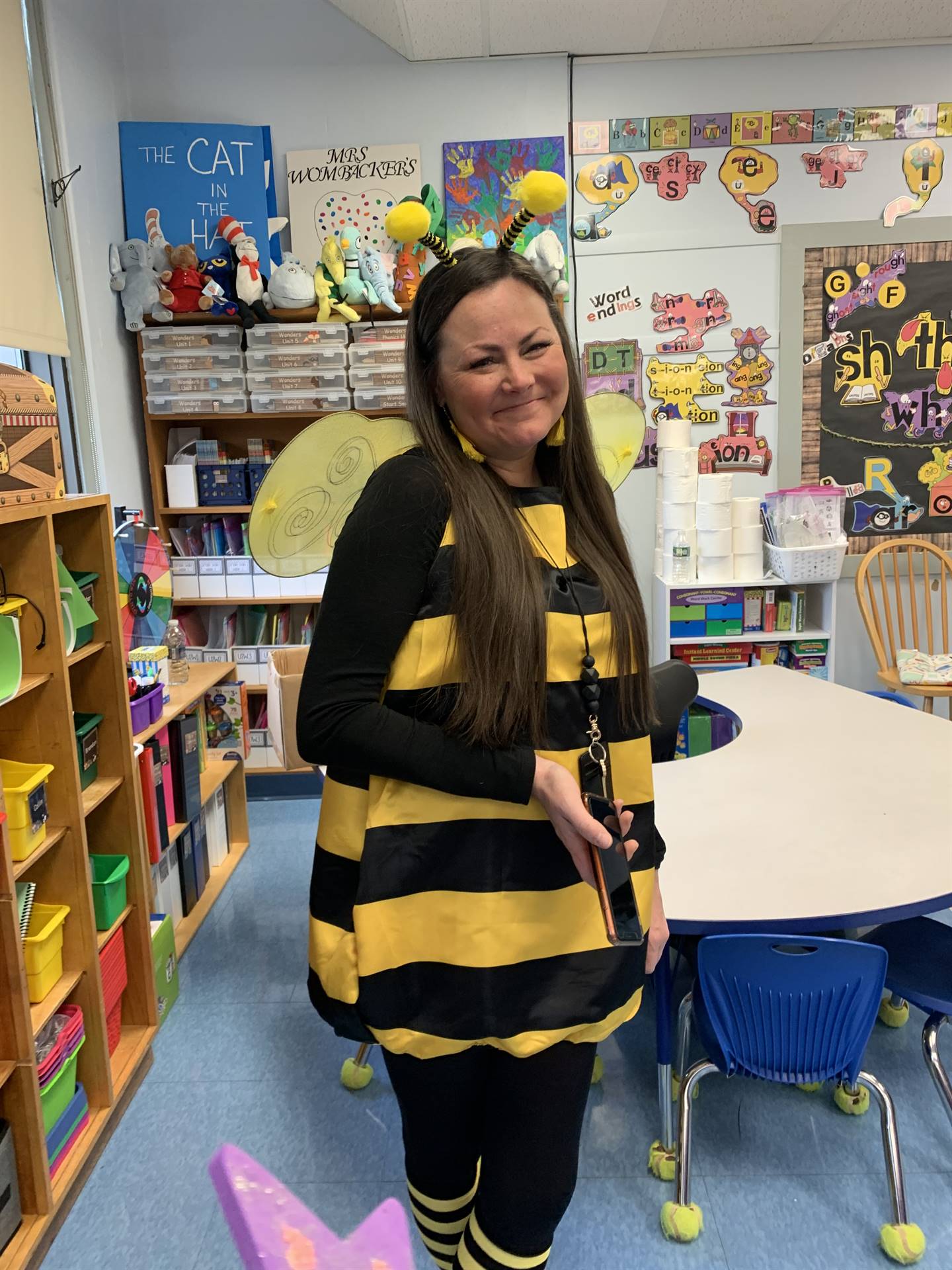 a teacher dressed as a bumble bee