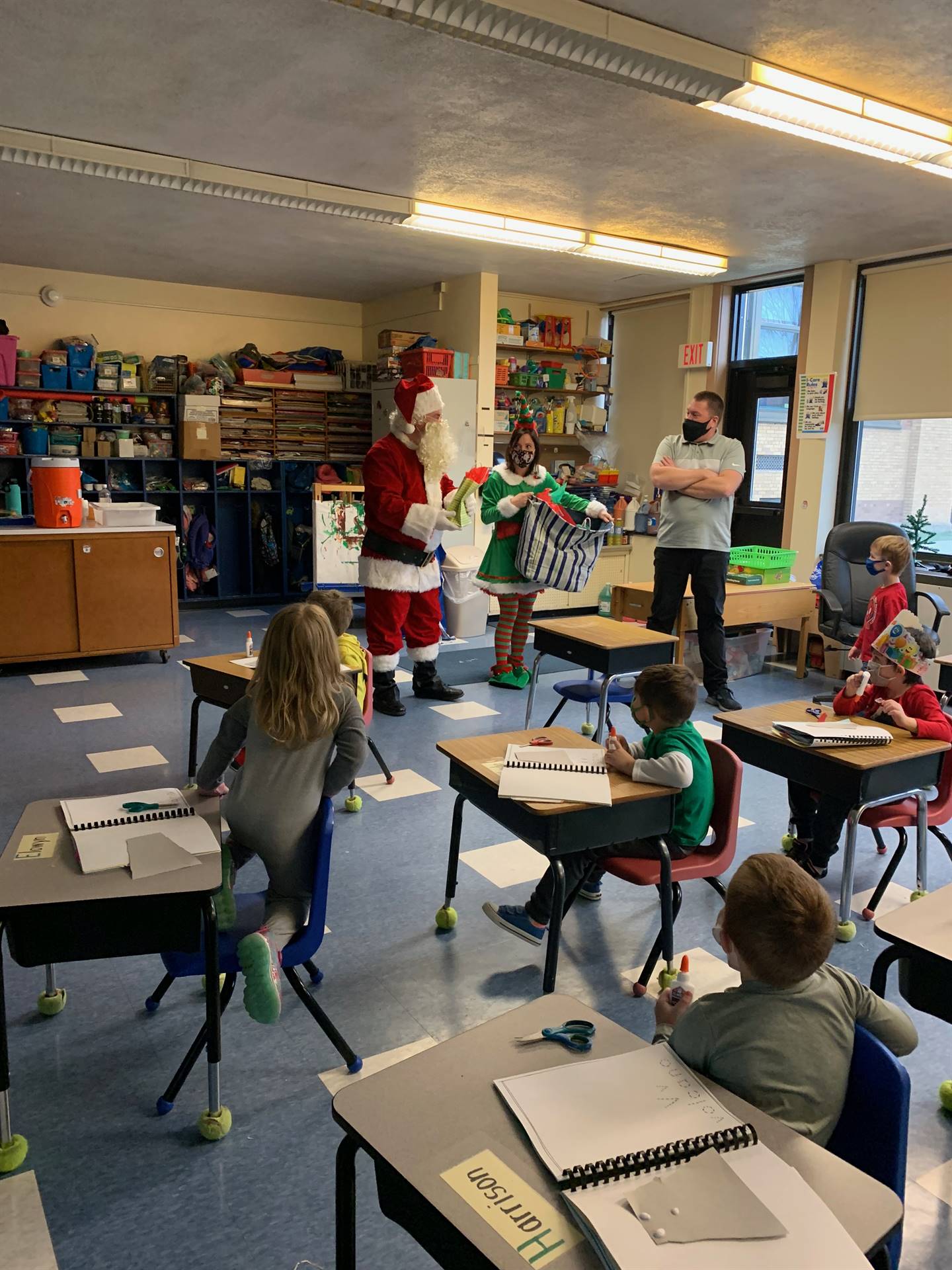 Santa enters classroom. 