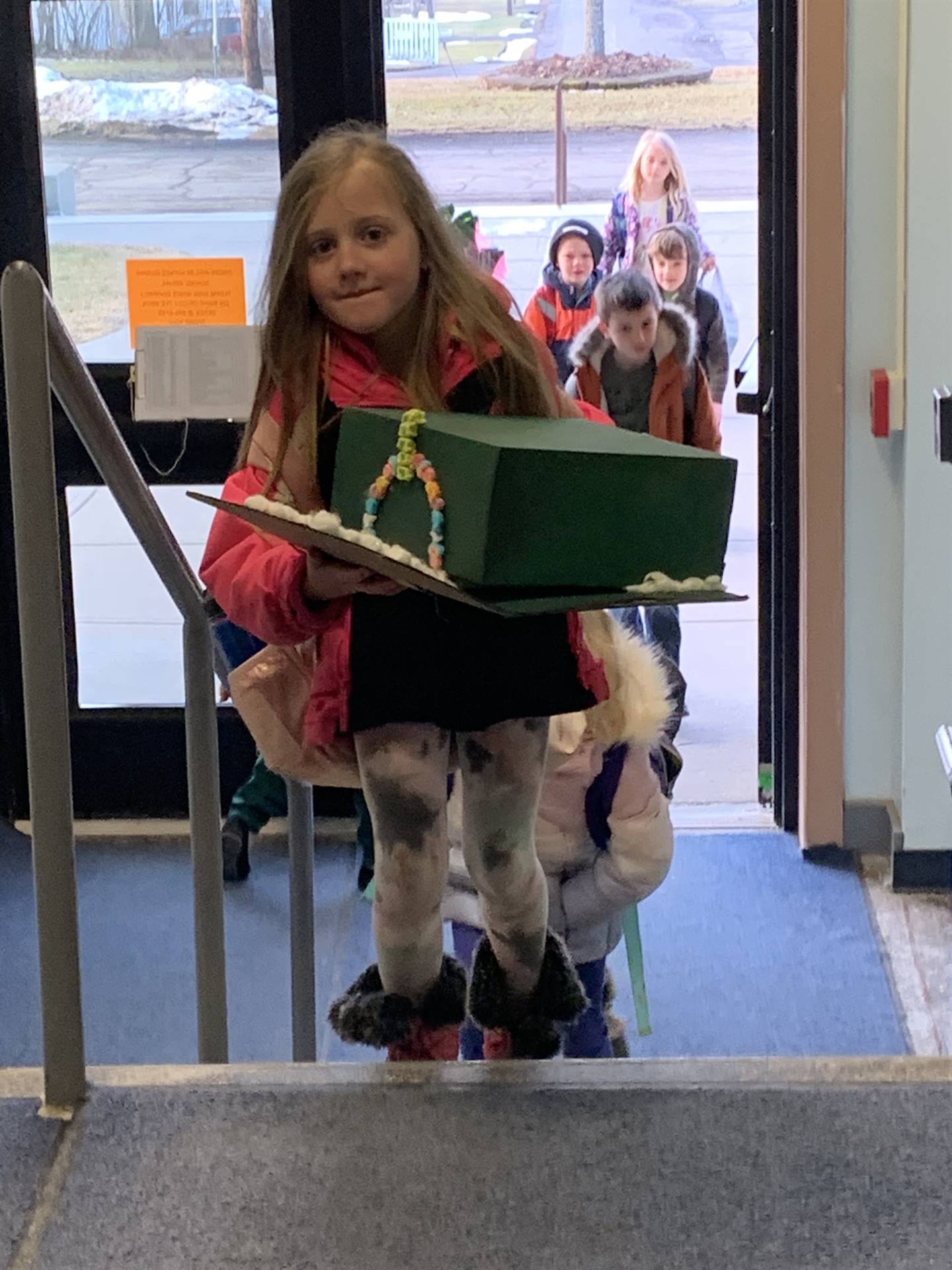 a student with leprechaun trap.