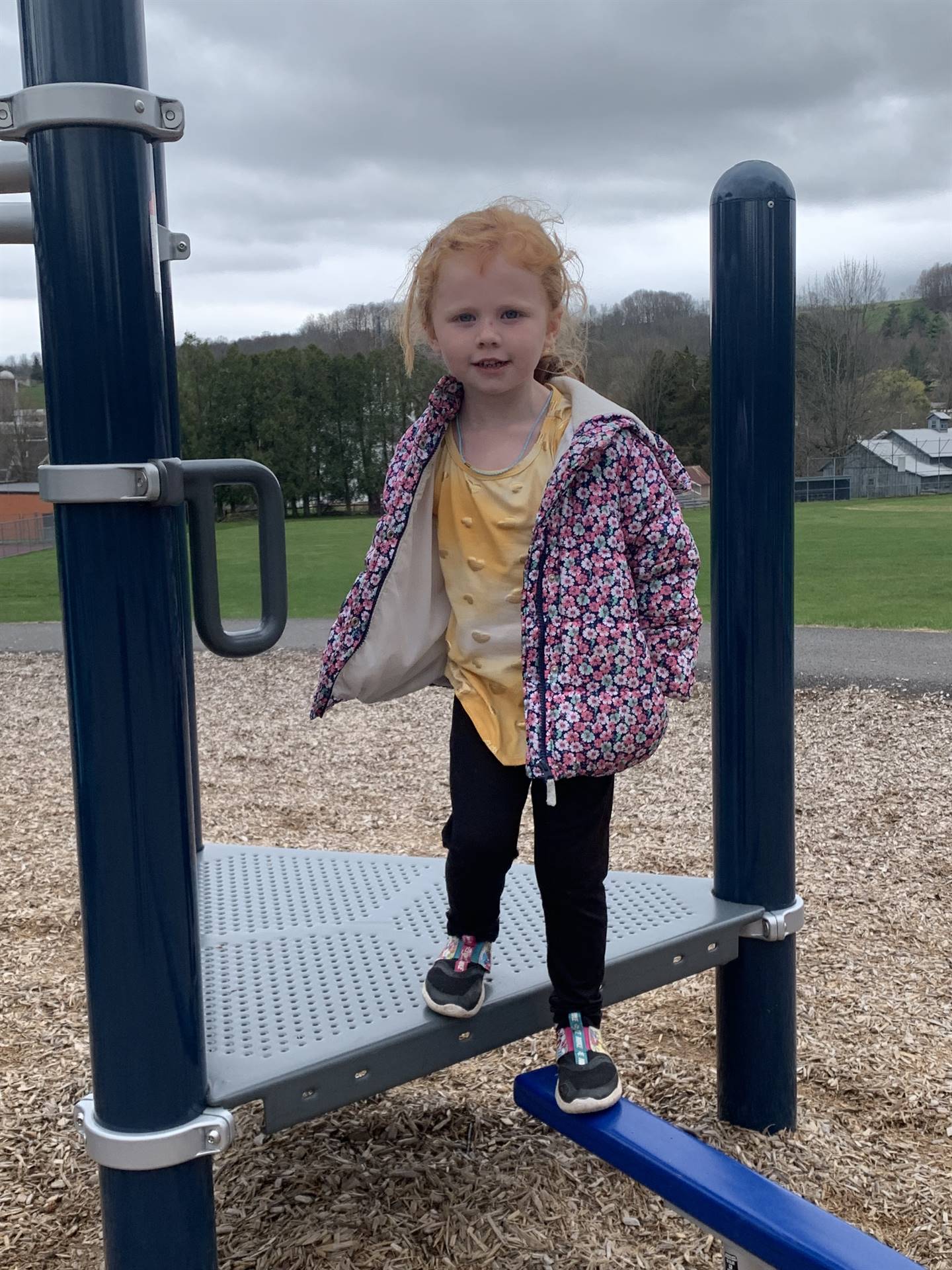 child on playground platform