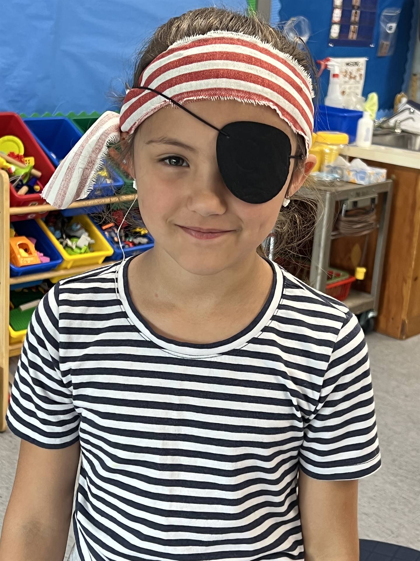 student dressed as pirate with eye patch and headband