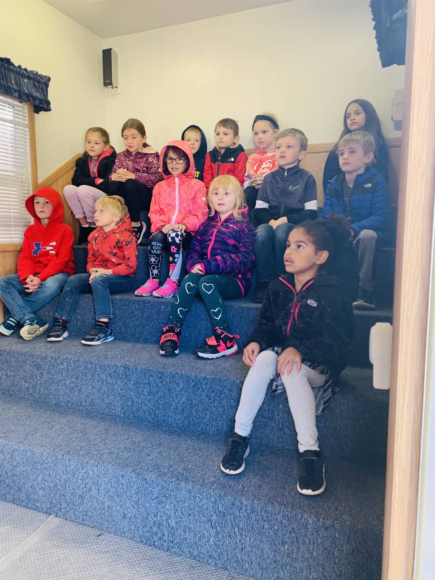 students sitting on steps.