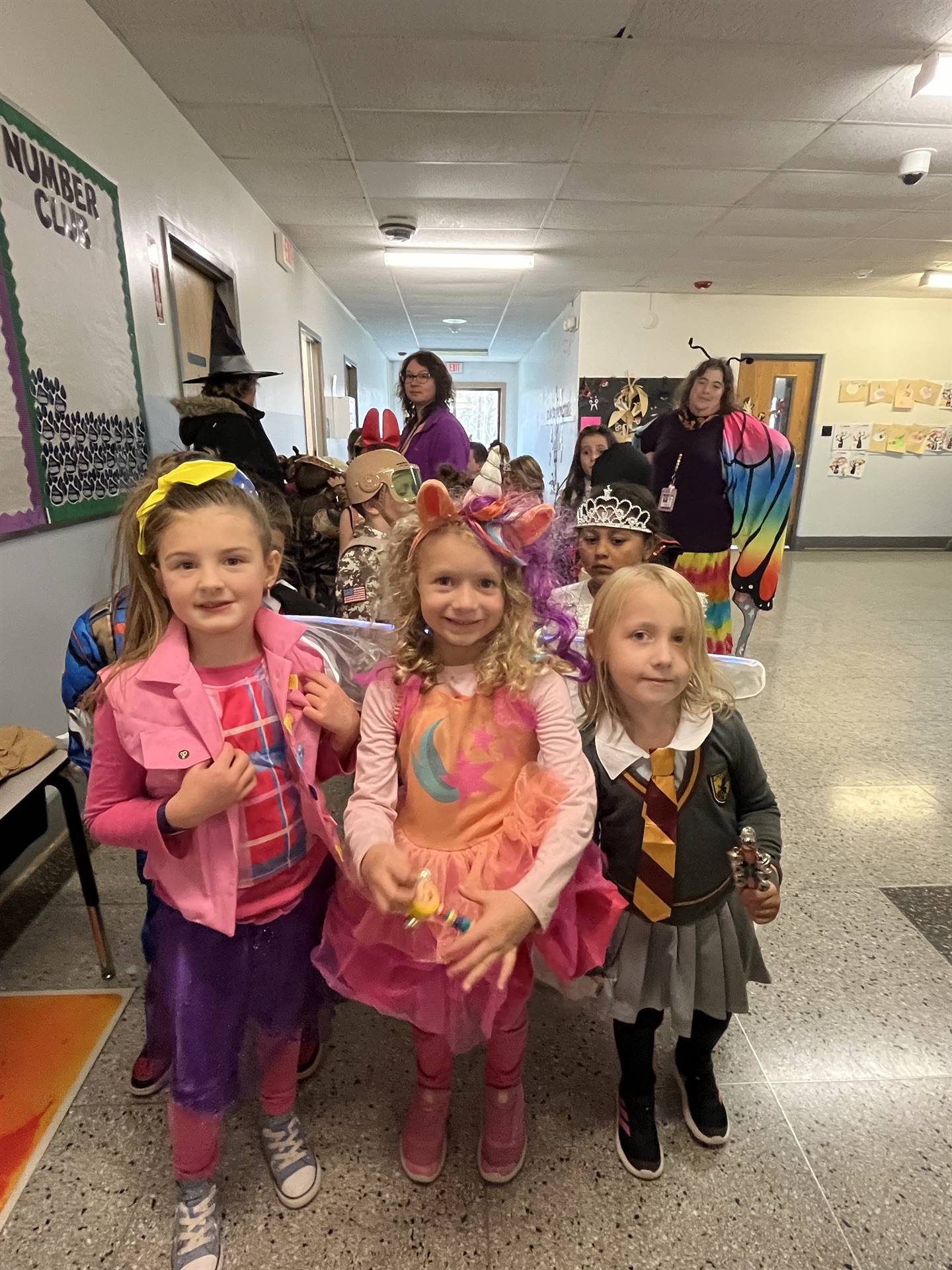 group of 3 students dressed up for Halloween