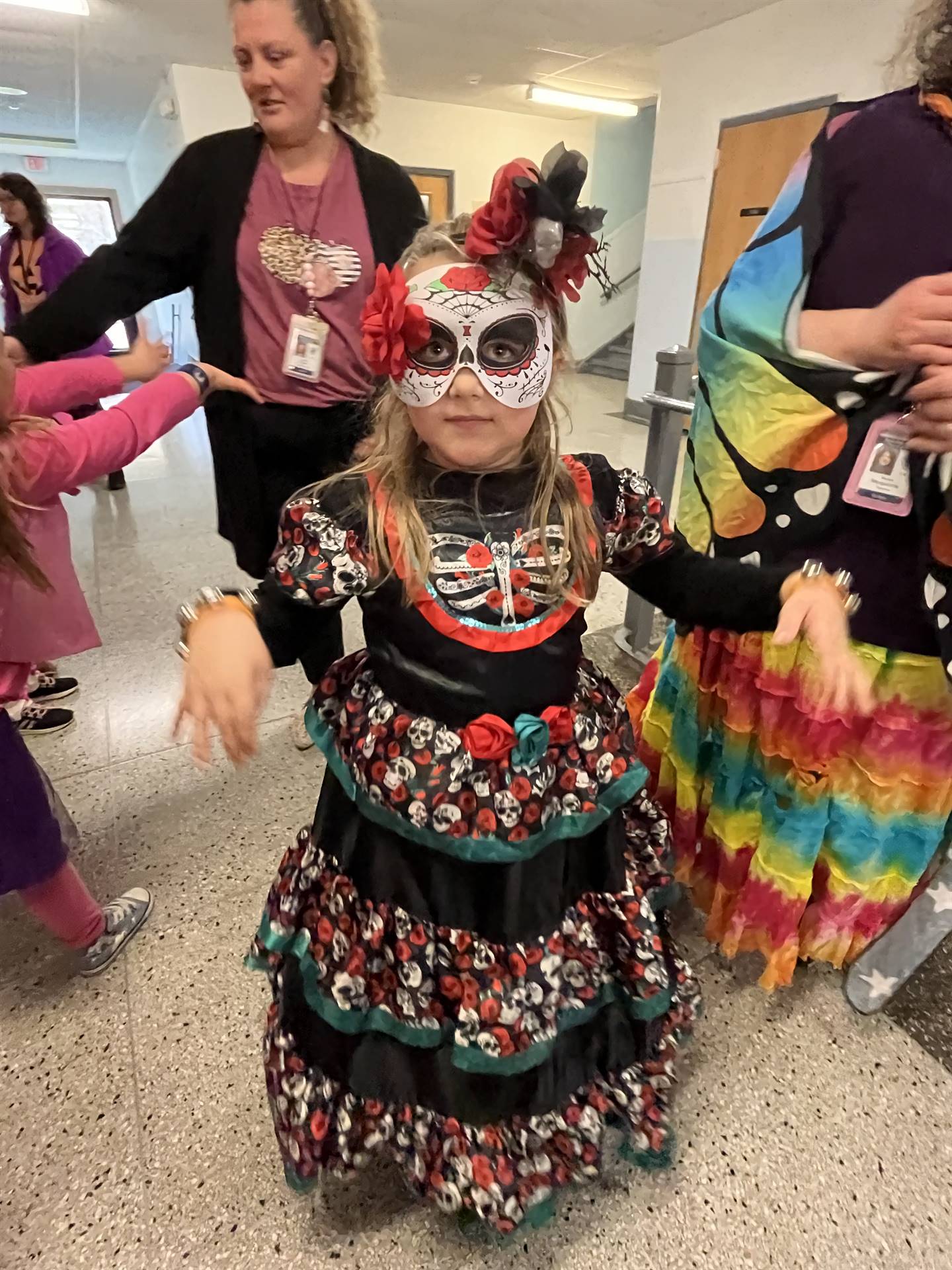 a student  dressed up for Dia Day La Muera (day of the dead)