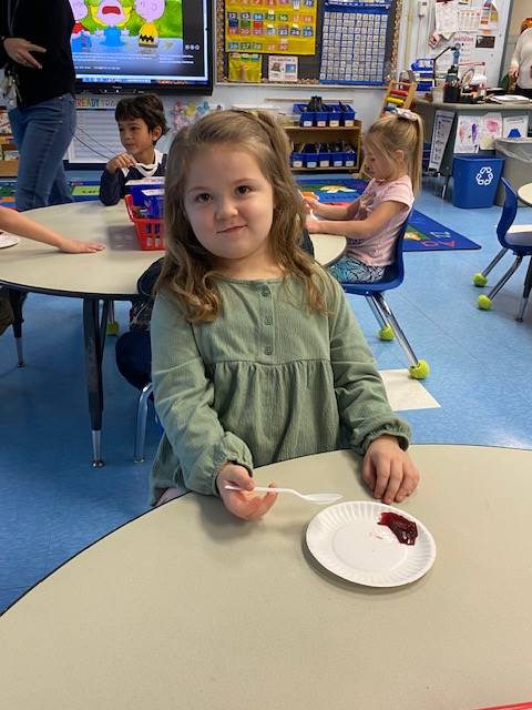 a student tries cranberry sauce