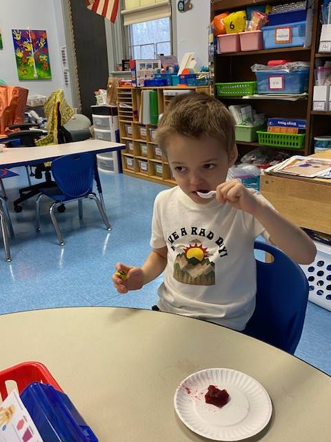 a student tries cranberry sauce