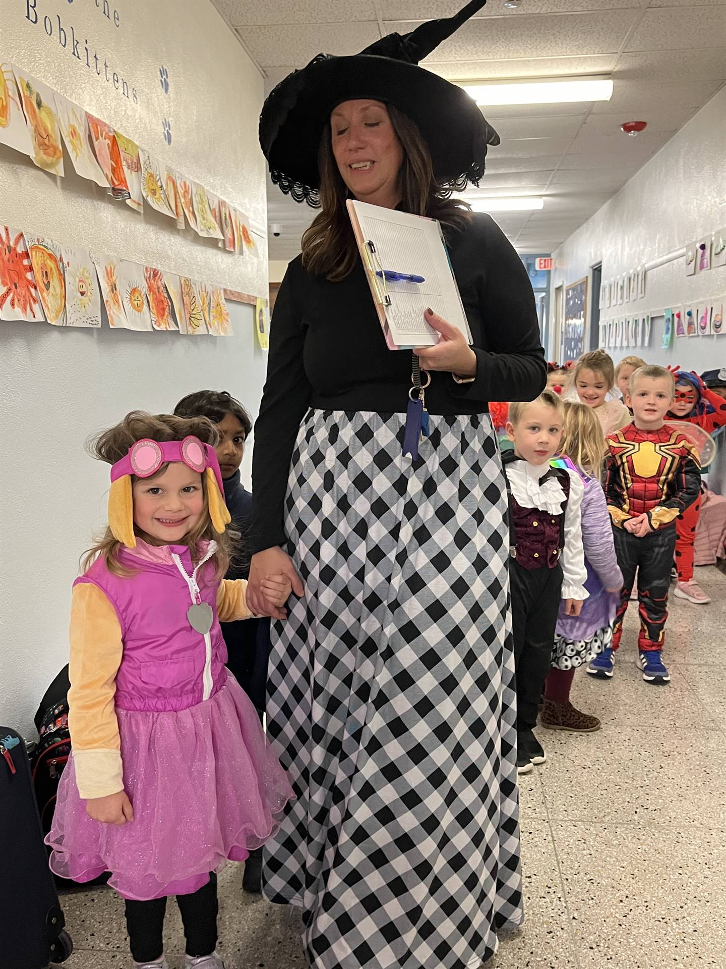 a teacher and a student dressed up for Halloween