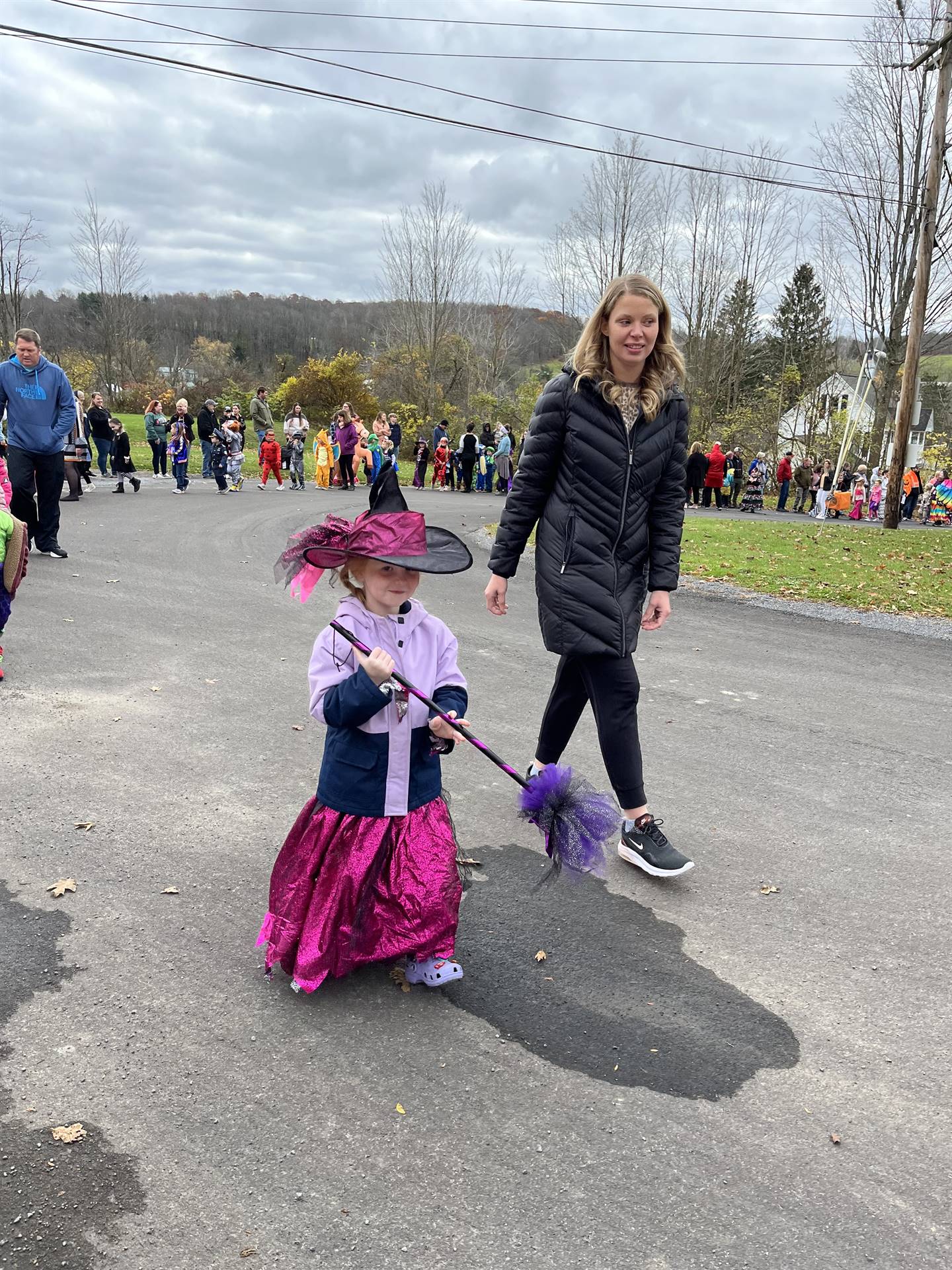 group of students dressed up for Halloween and parading.