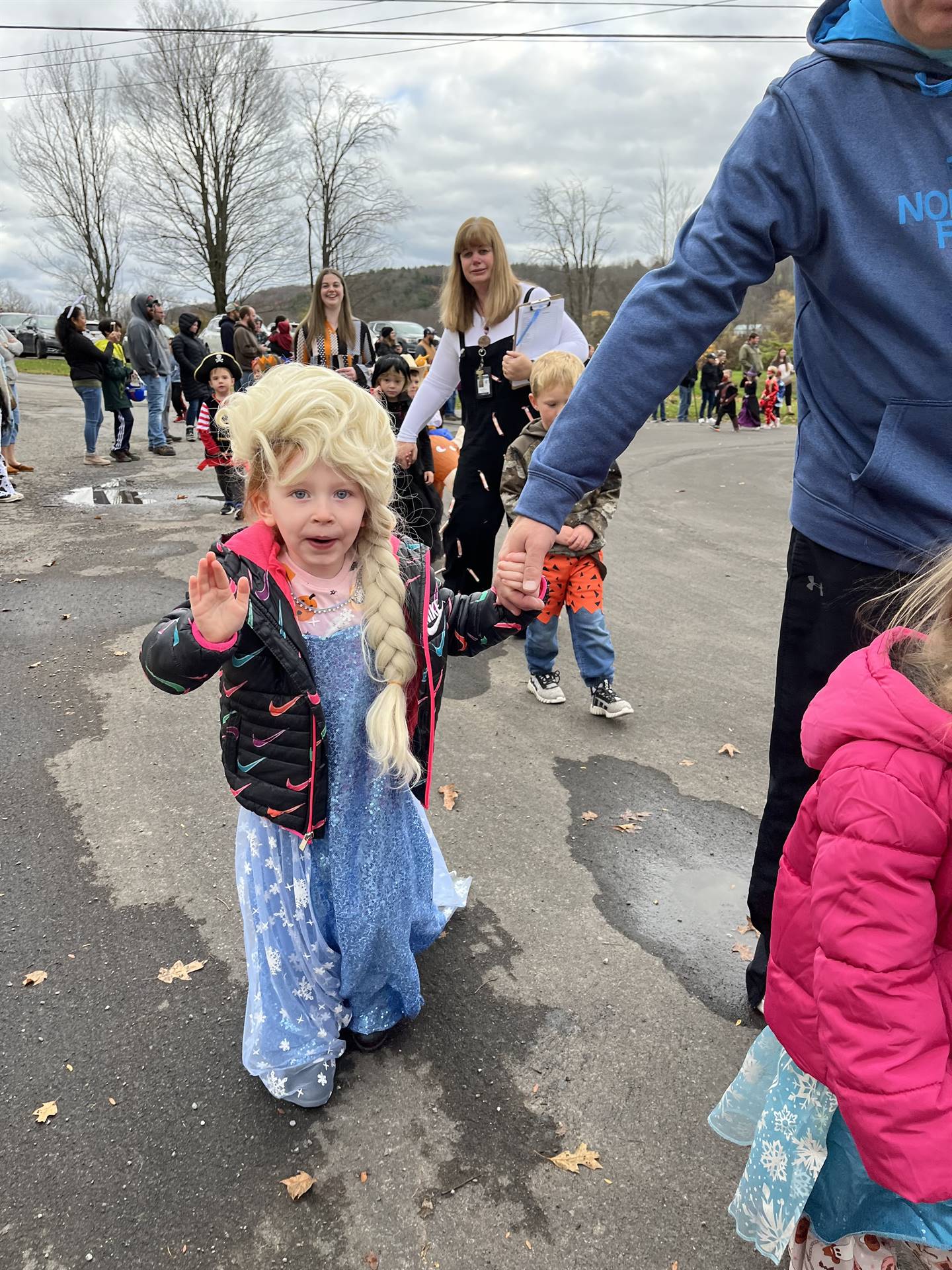 group of students dressed up for Halloween and parading.