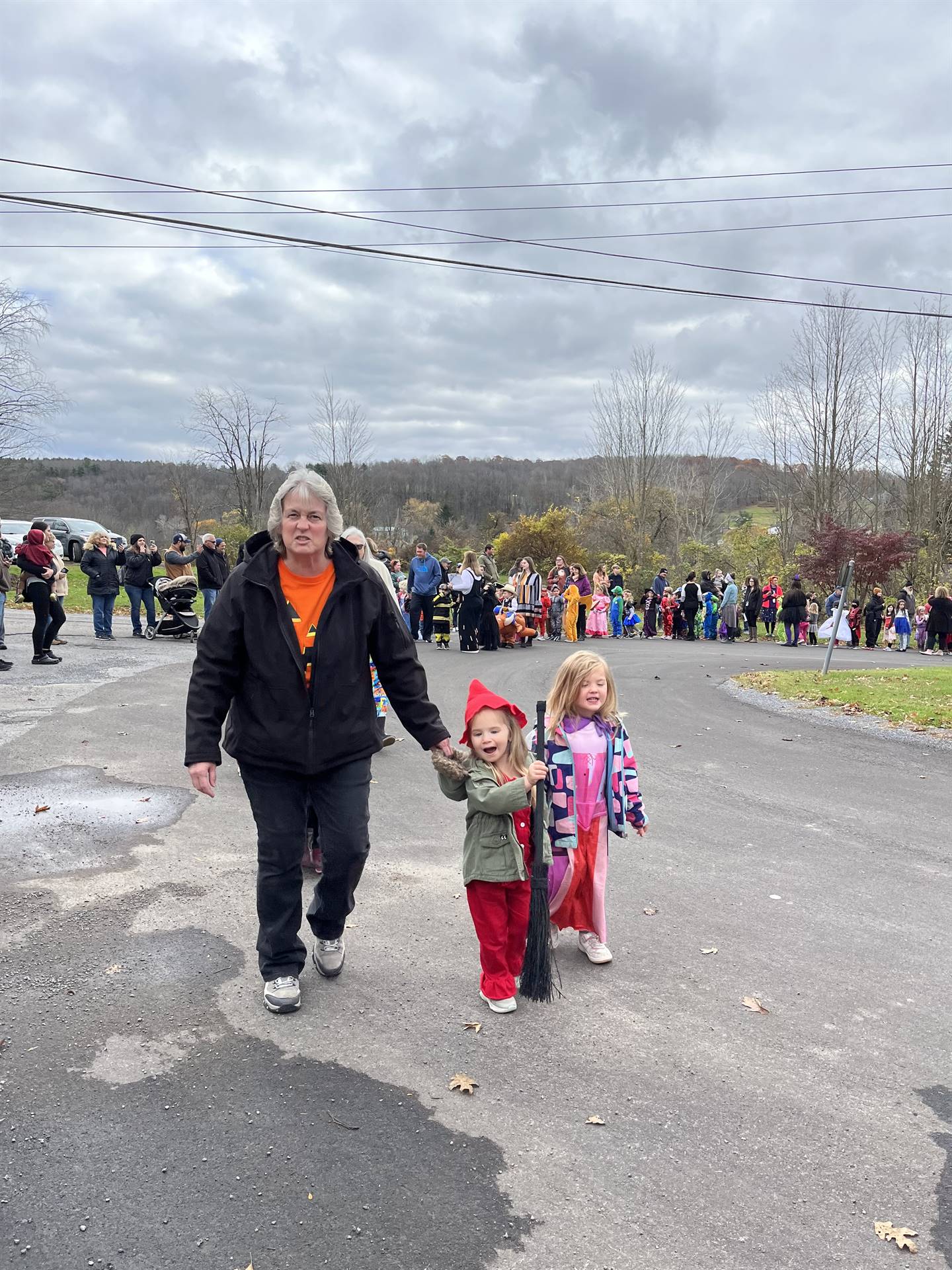 group of students dressed up for Halloween and parading.