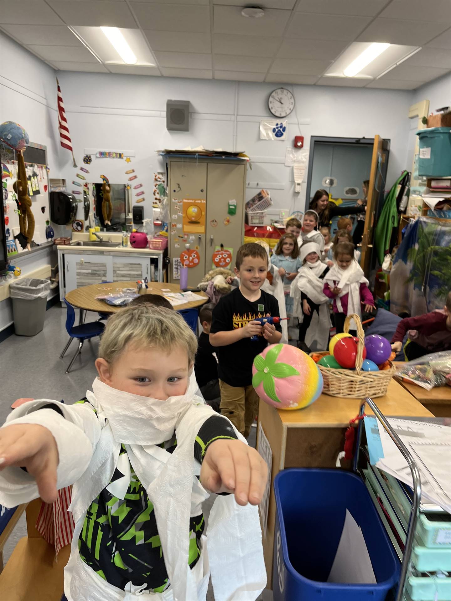 kid Mummies walking into a classroom