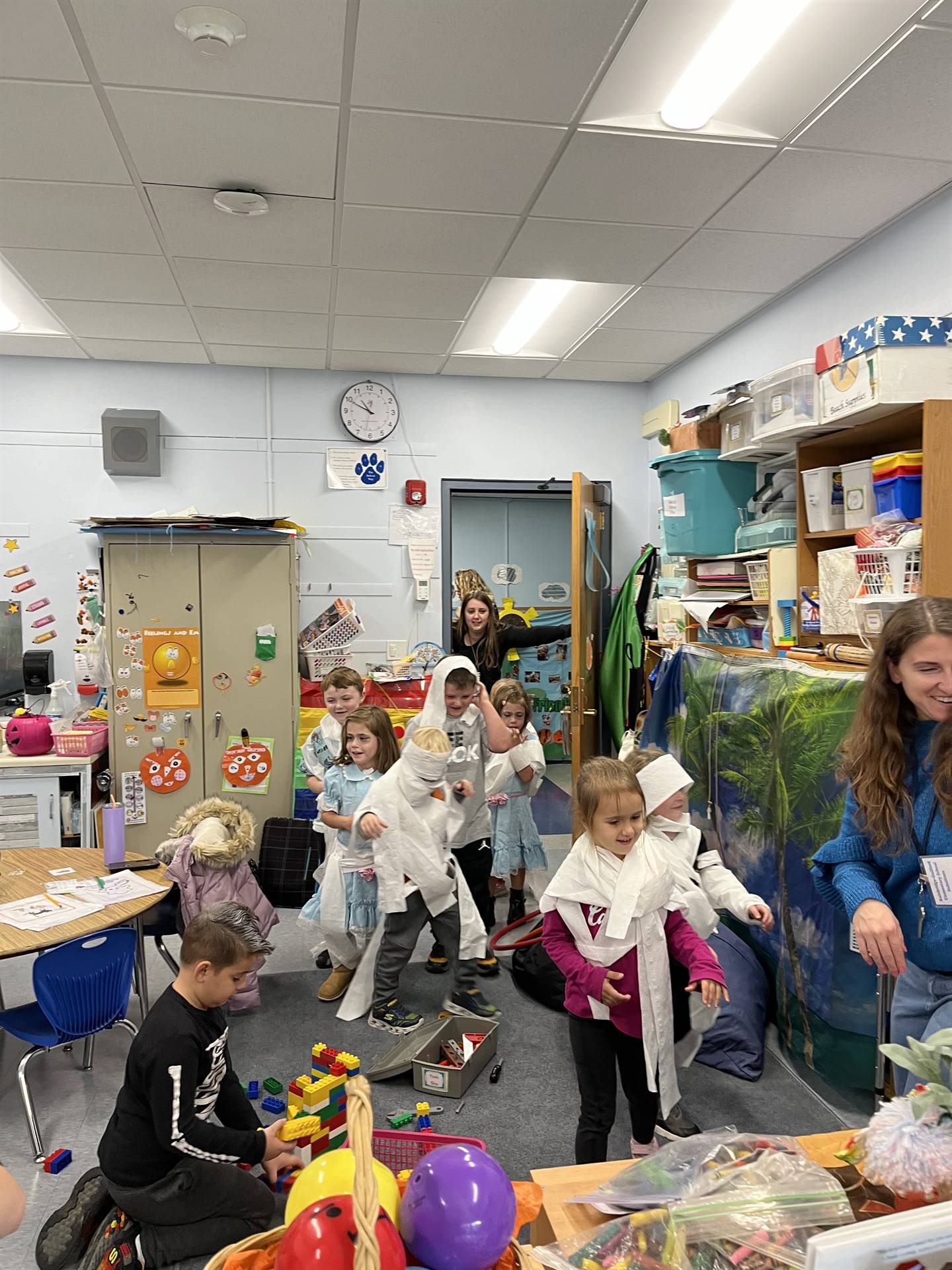kid Mummies walking into a classroom