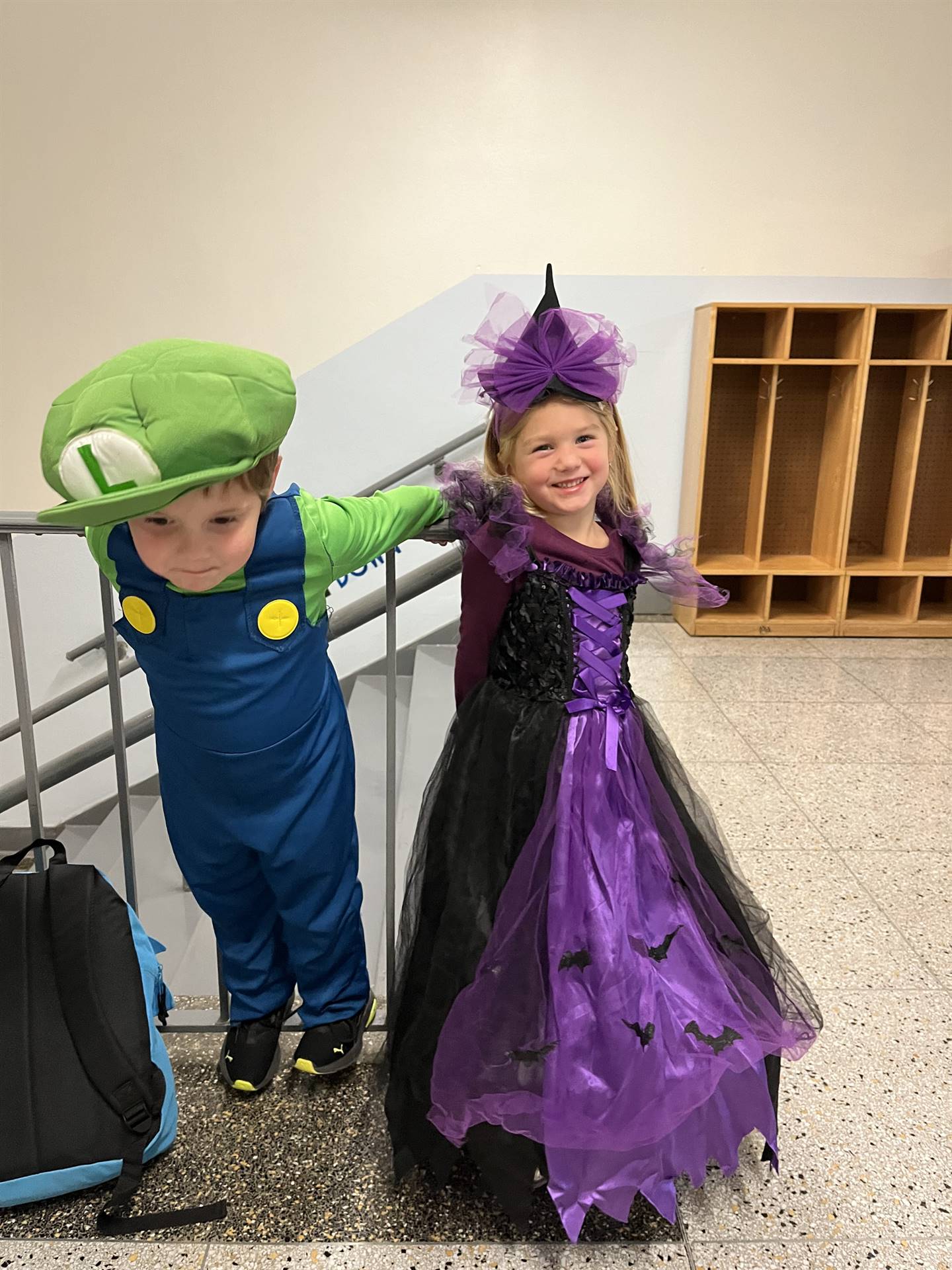 a purple princes and a student dressed as a police officer