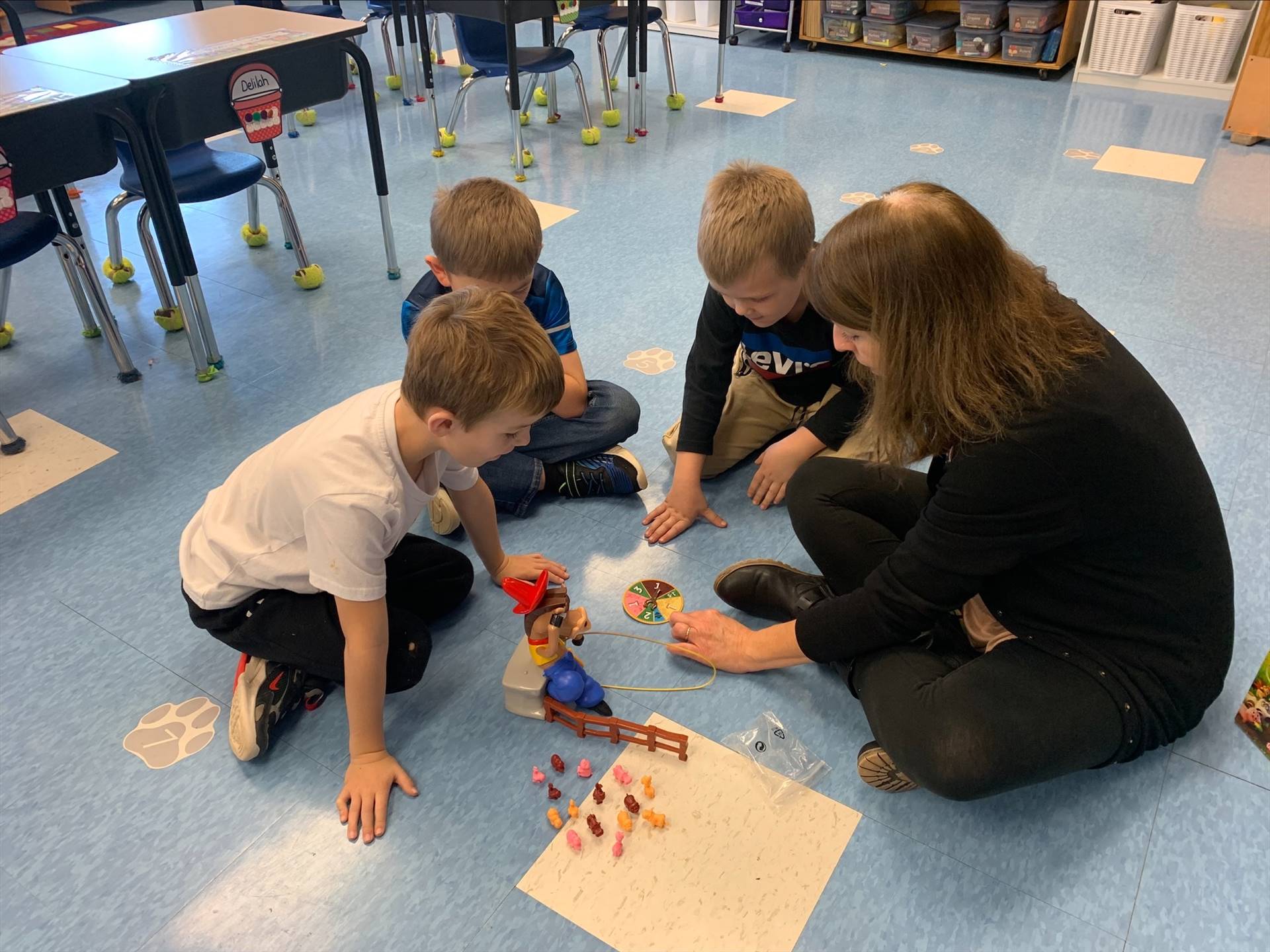 A teacher plays a game with students