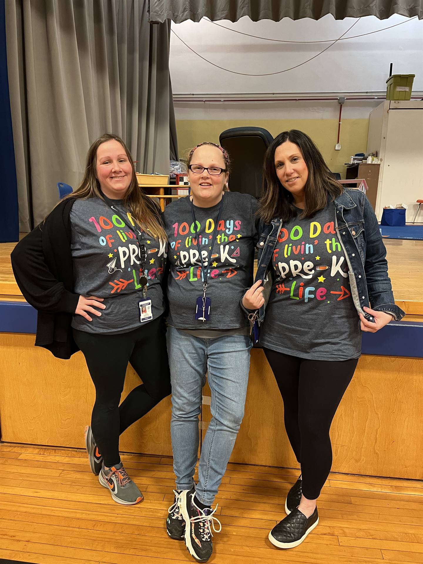 3 teachers dressed in same shirts