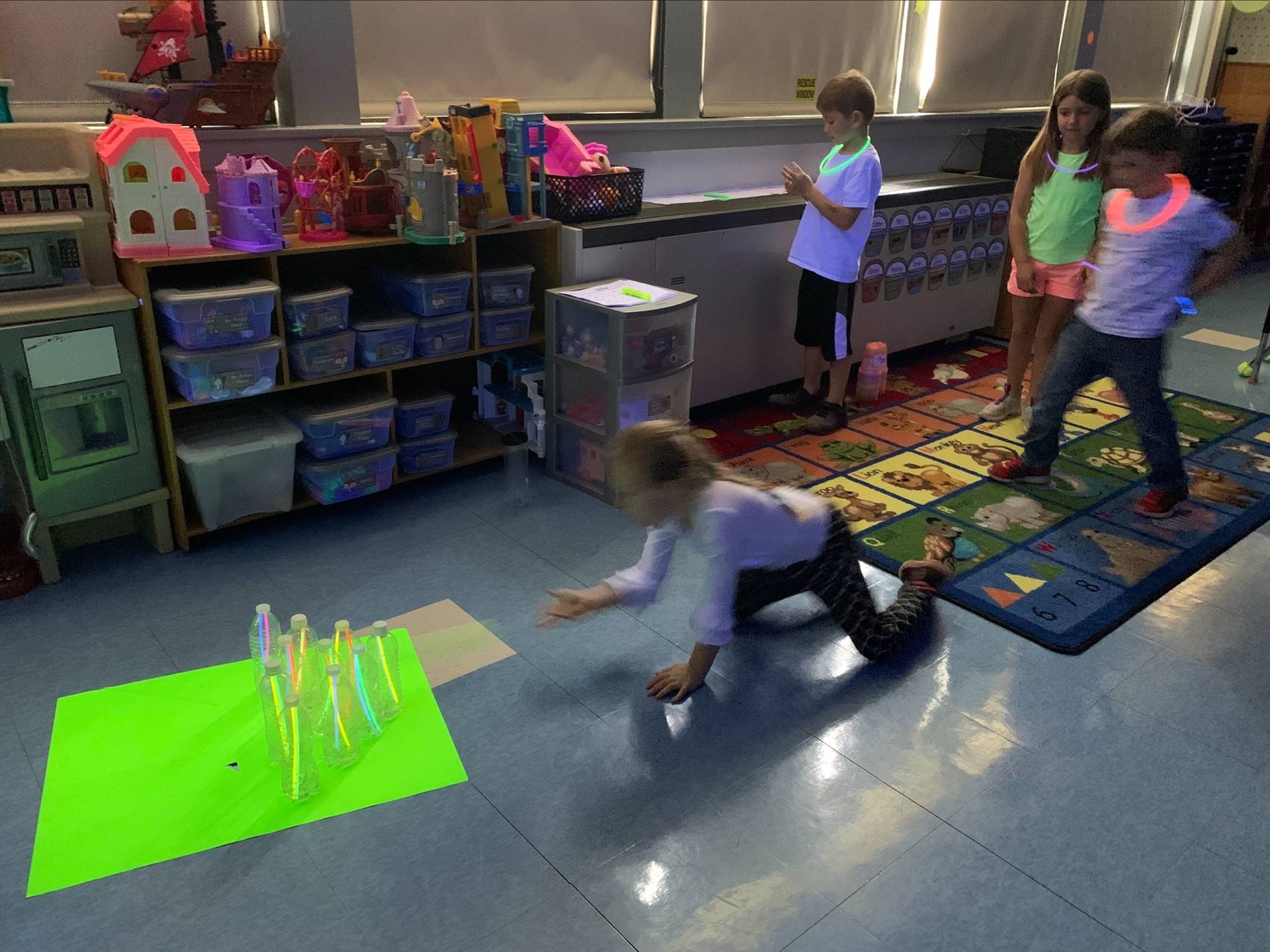 a student throws a ball to bowl. 