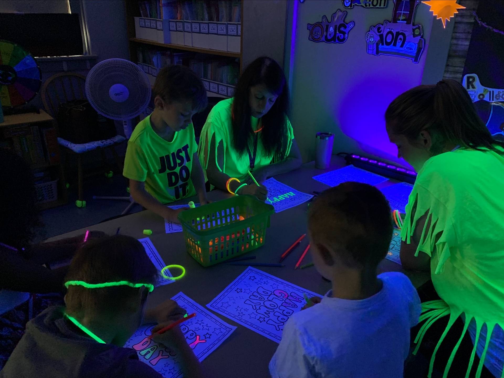 students in glowing t shirts
