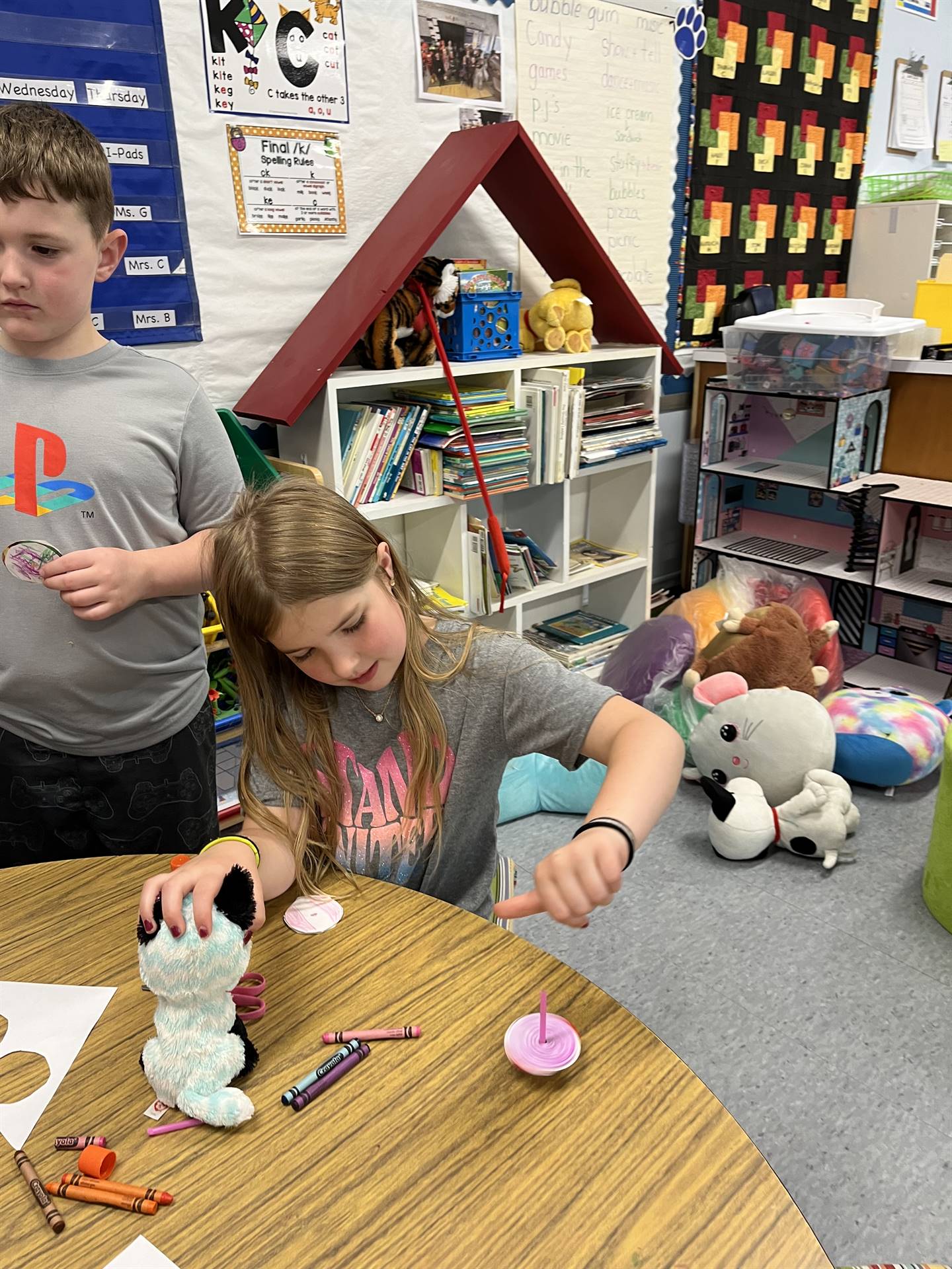 students trying out their homemade spinning tops