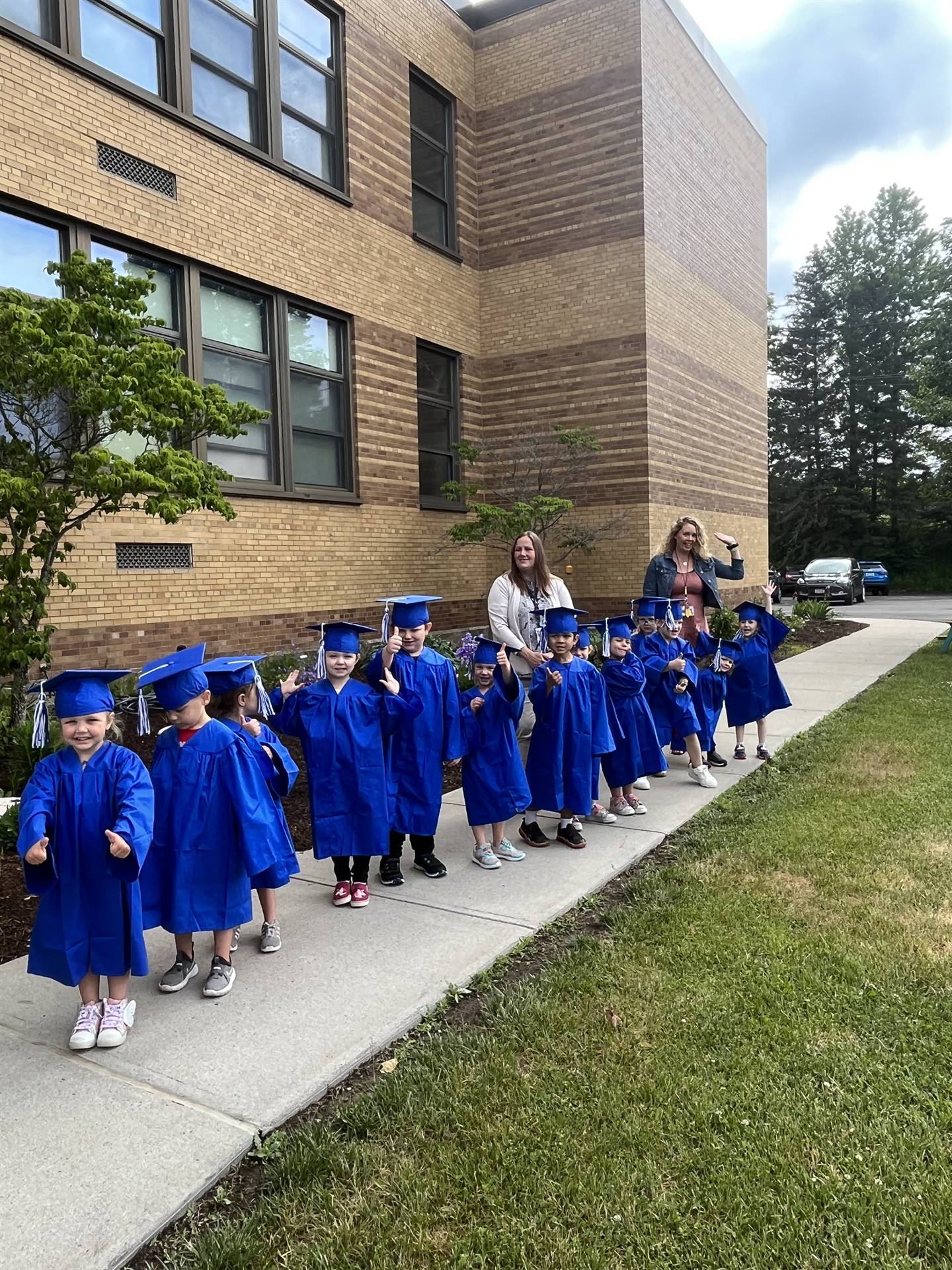 Pre K graduate students ready to greet senior graduates