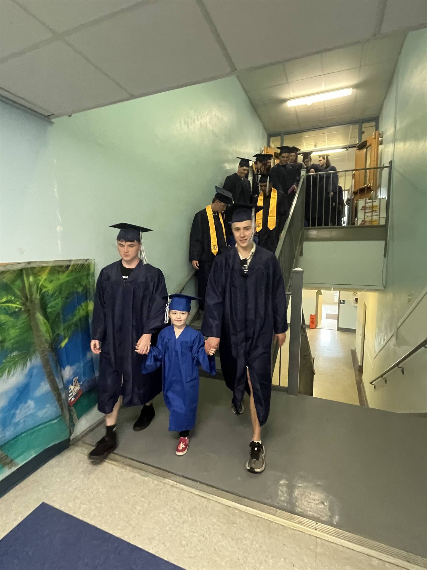 2023 Senior graduates in the hallway of their primary school