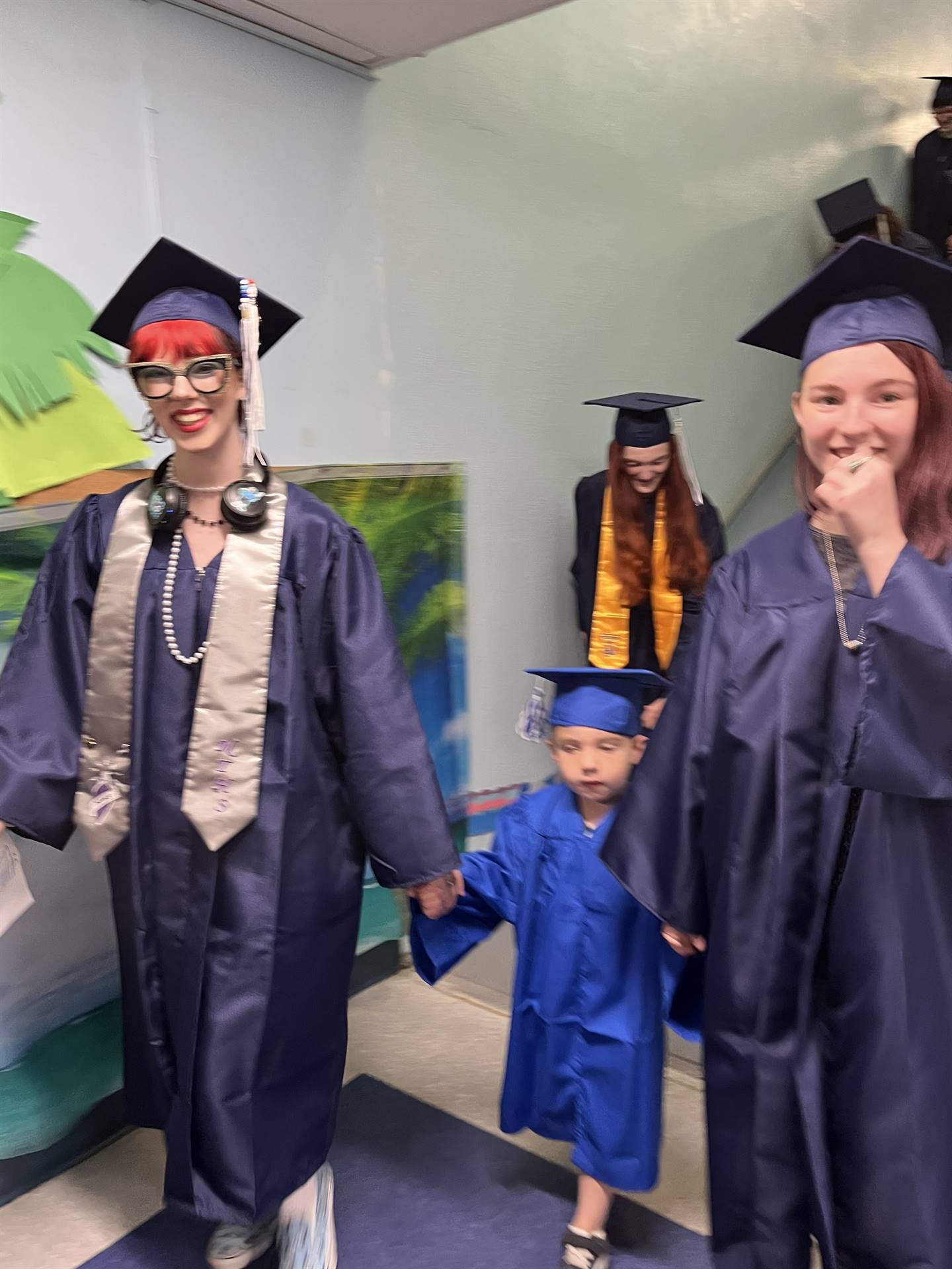 2023 Senior graduates in the hallway of their primary school