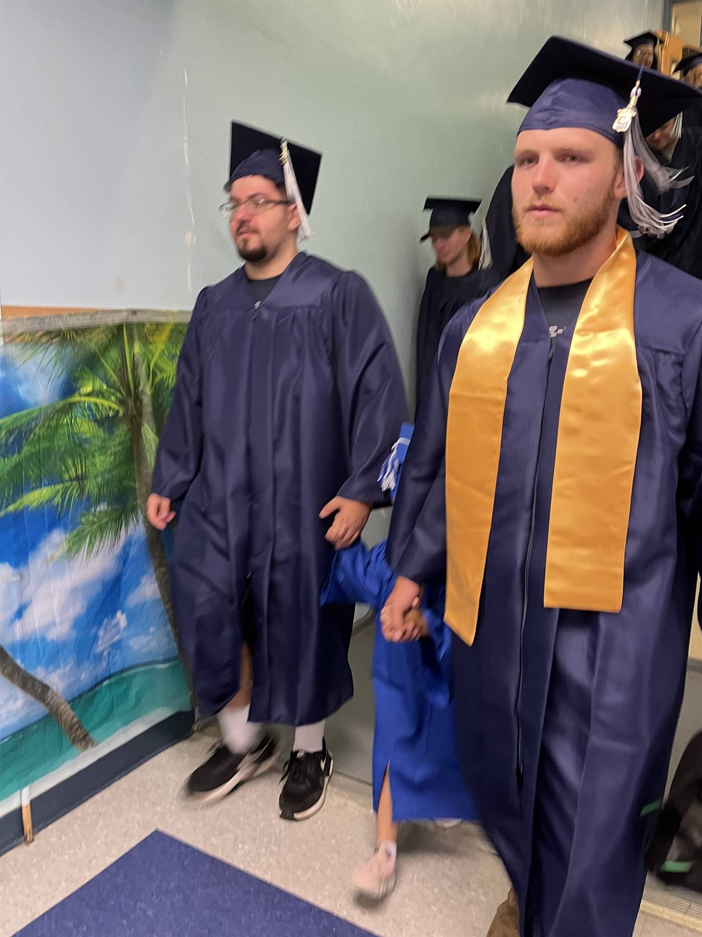 2023 Senior graduates in the hallway of their primary school