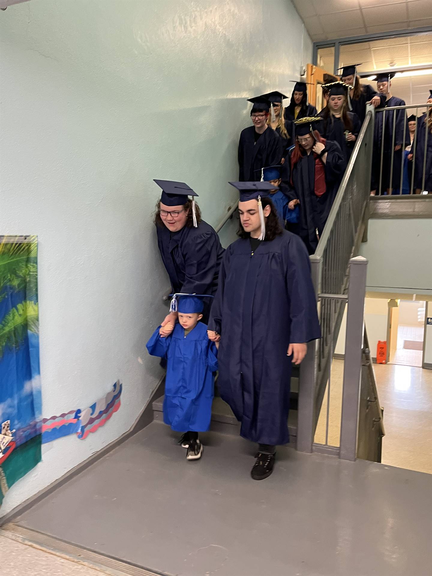 2023 Senior graduates in the hallway of their primary school