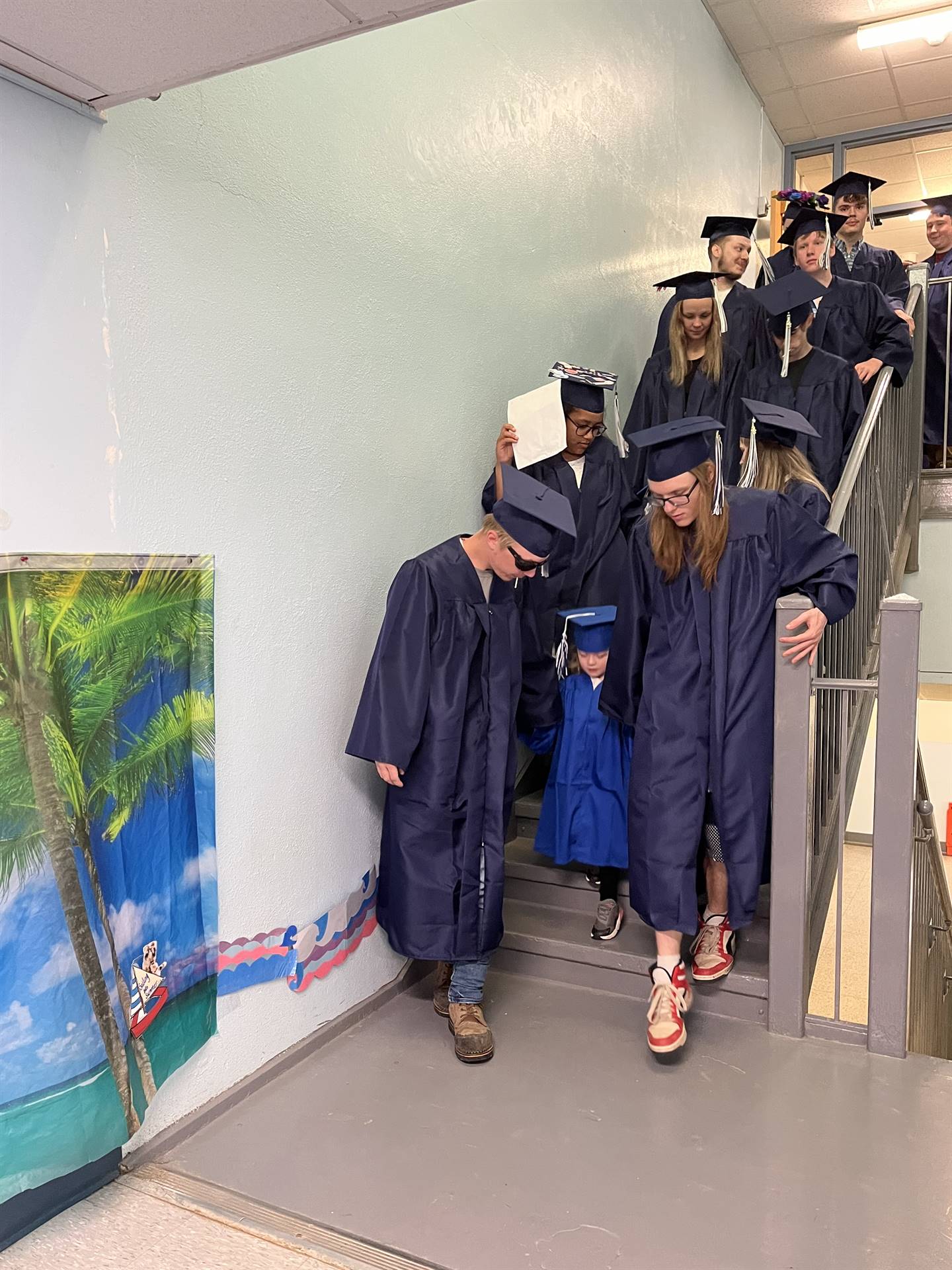 2023 Senior graduates in the hallway of their primary school