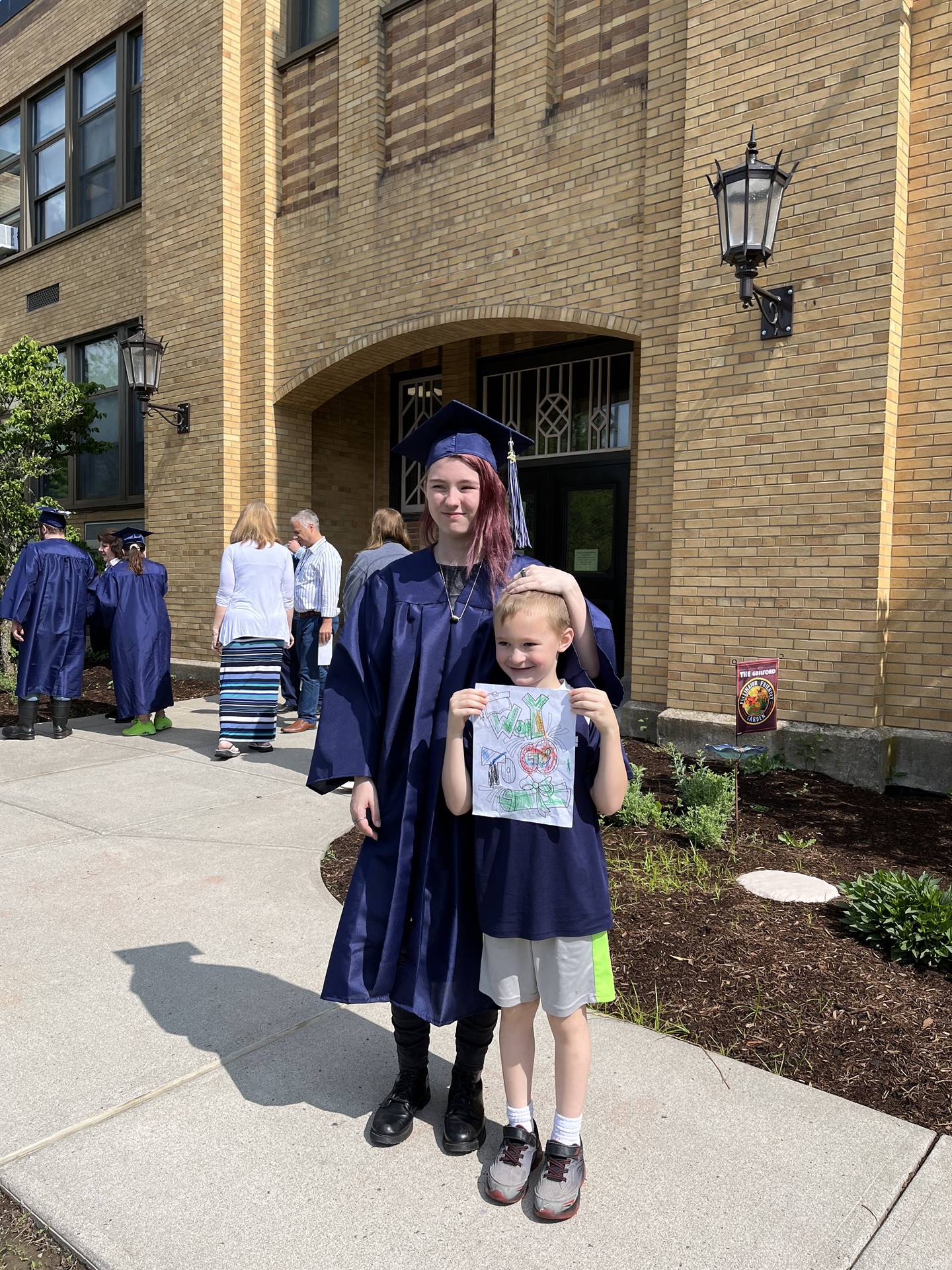 Kindergarten student with his 2023 Senior graduate sister