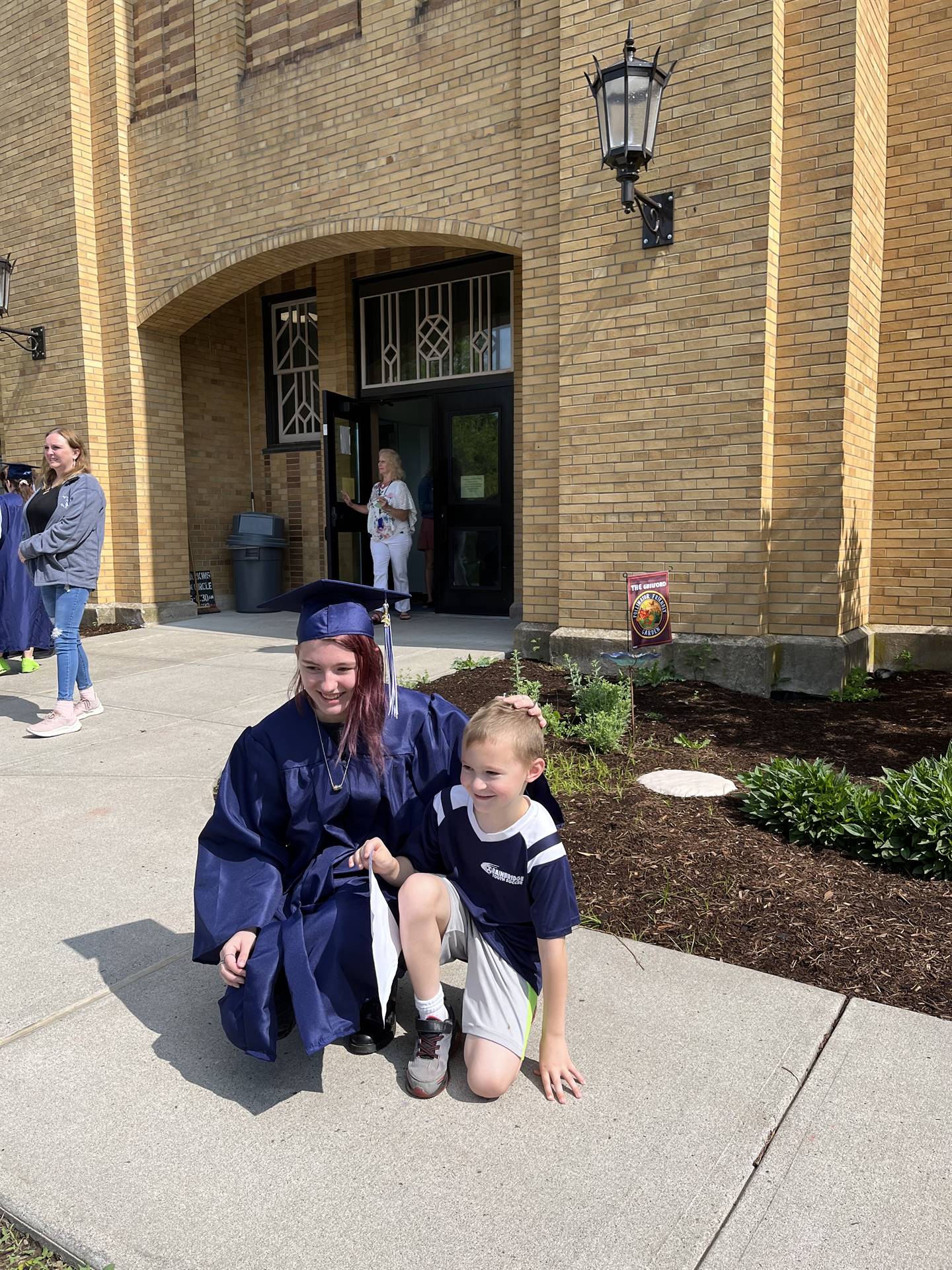 Kindergarten student with his 2023 Senior graduate sister