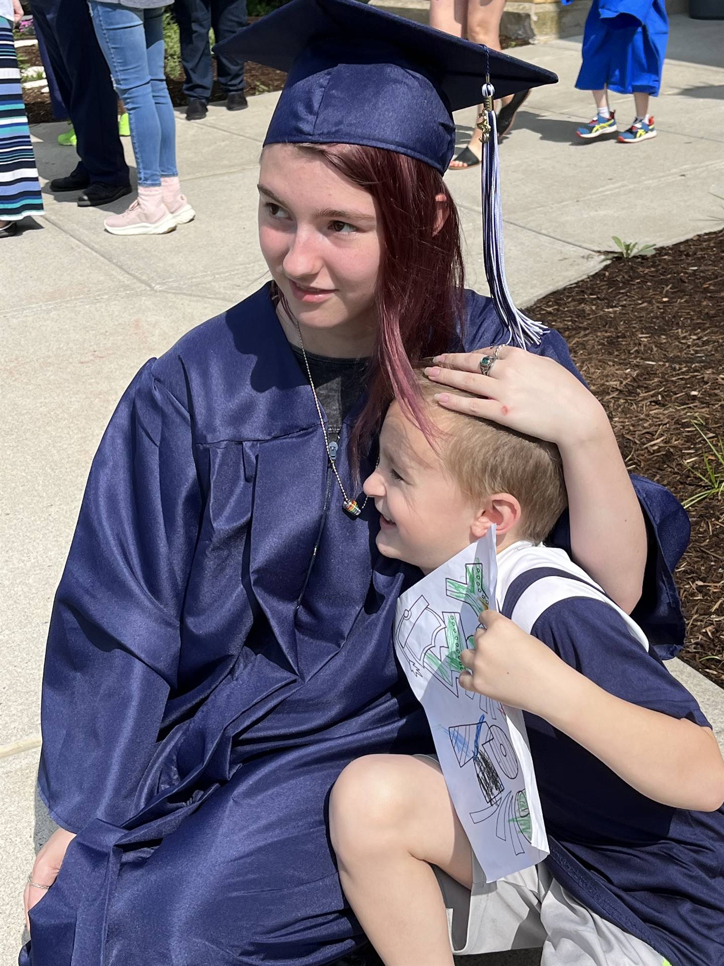 Kindergarten student with his 2023 Senior graduate sister