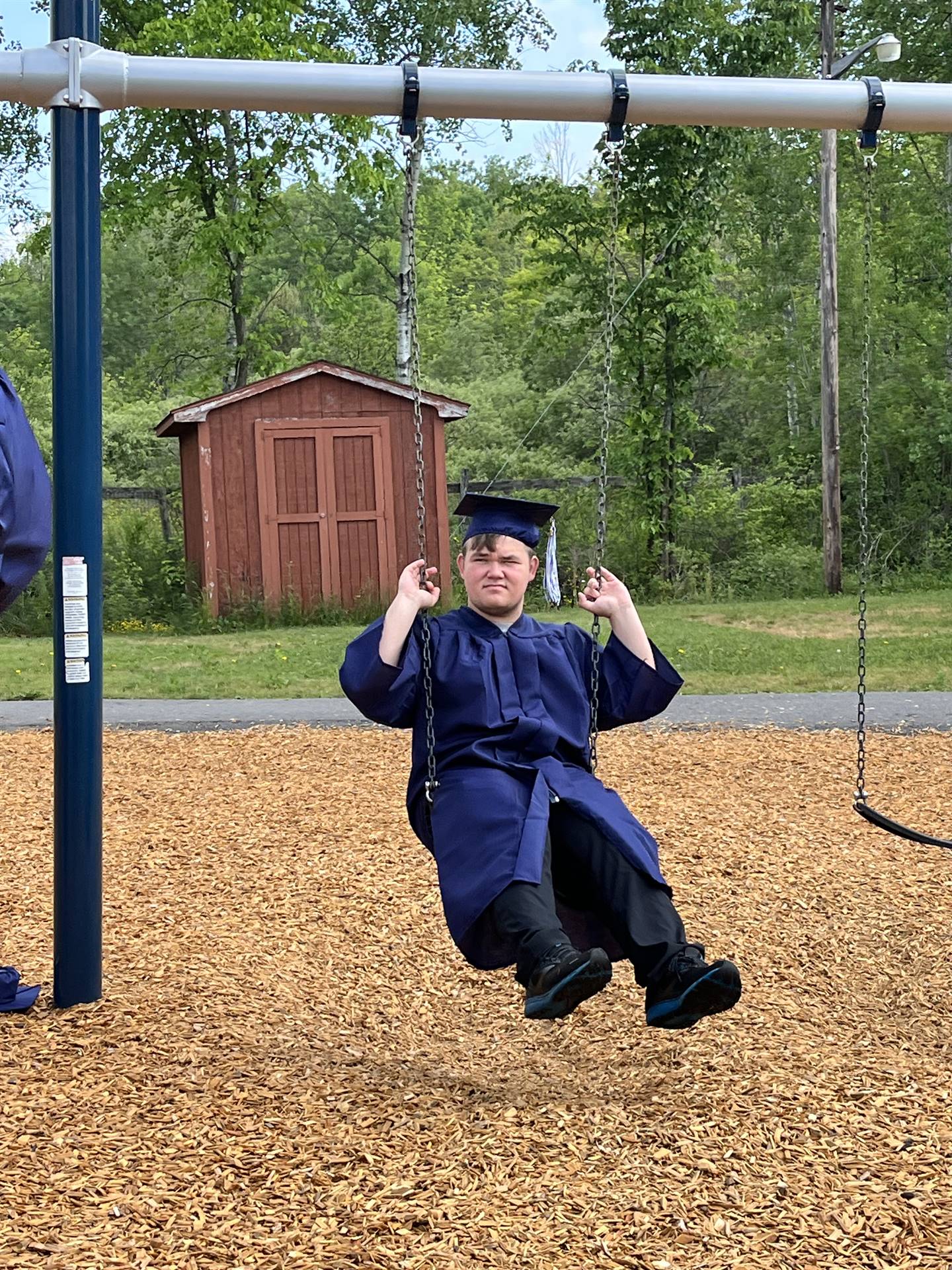Senior graduate swinging