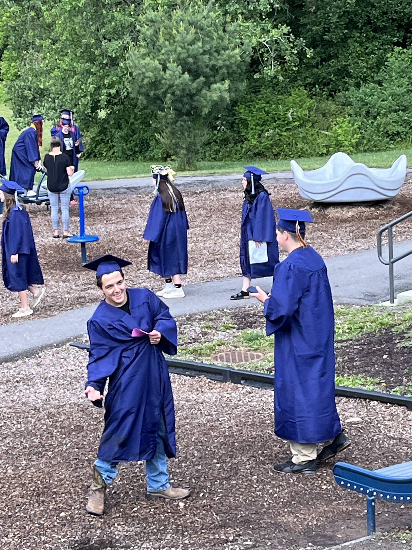 Senior graduates on Primary school playground