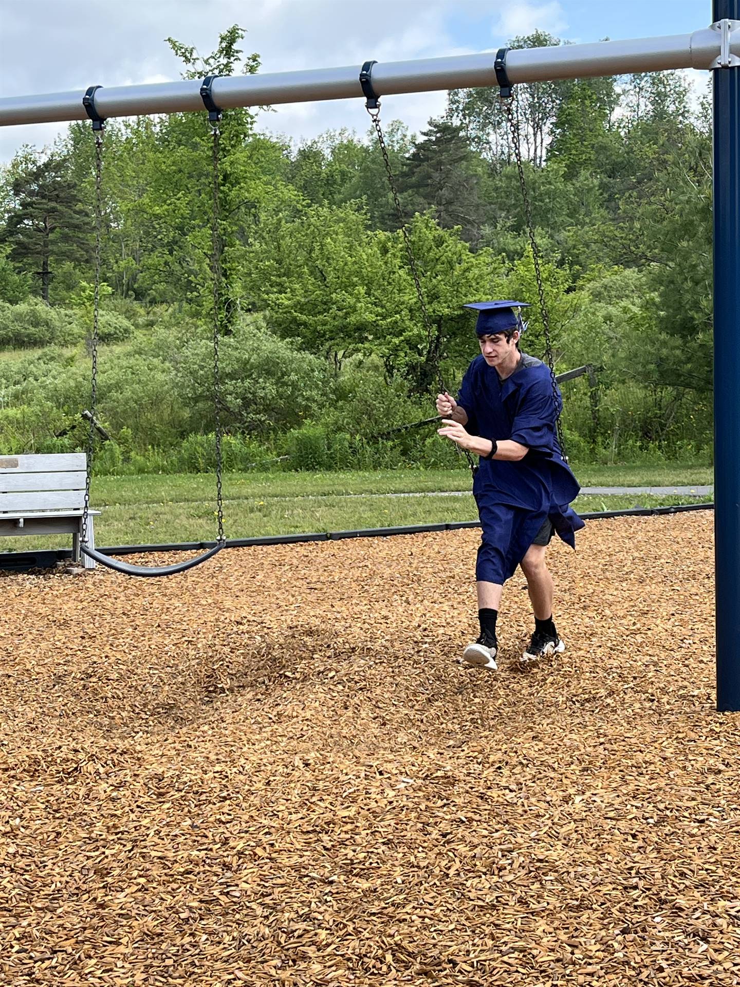 Senior graduate swinging